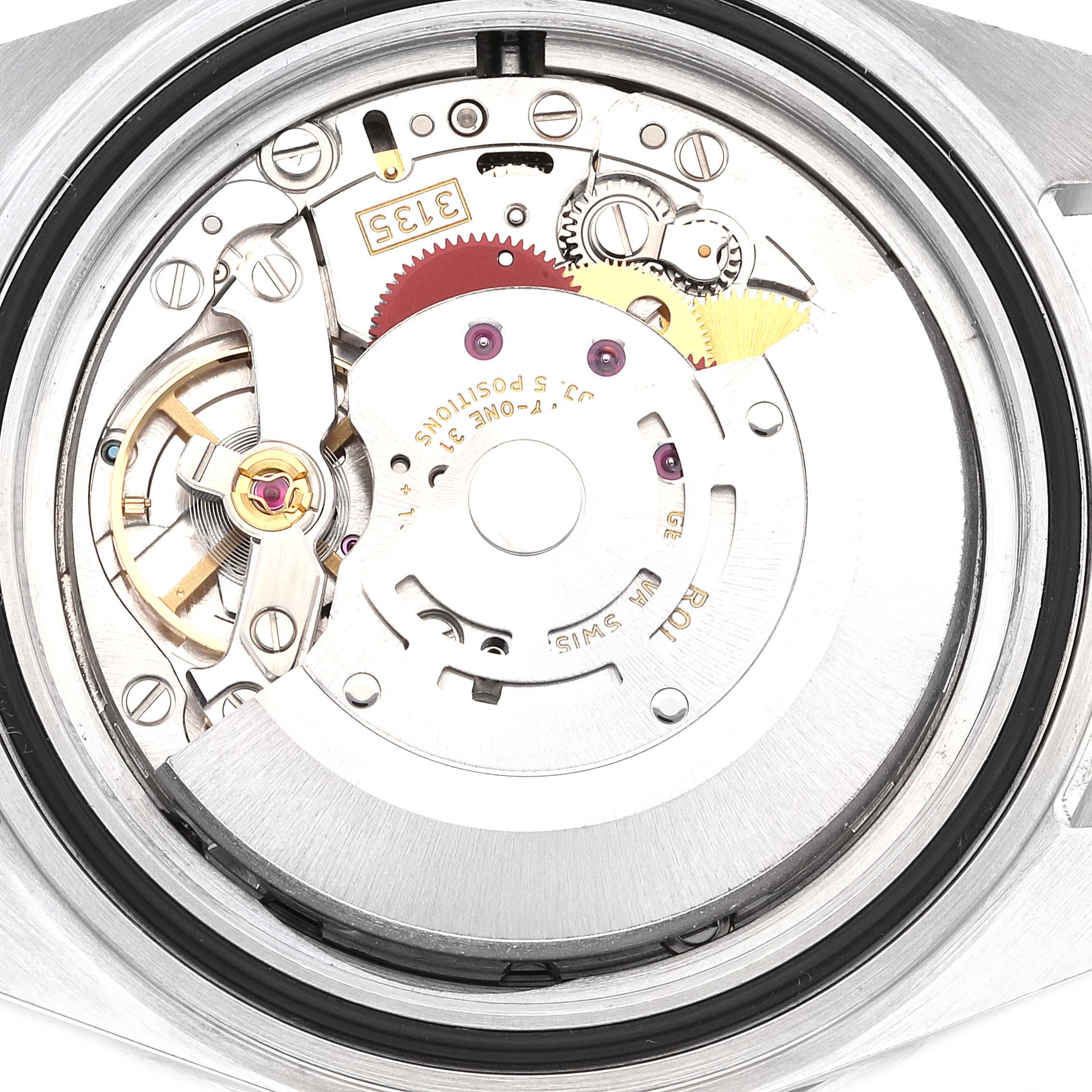 The image shows a close-up view of the internal mechanism of a Rolex Submariner 16610 Men
s Stainless Steel Black Dial 16610 Men
s Stainless Steel Black Dial watch, specifically its movement parts.