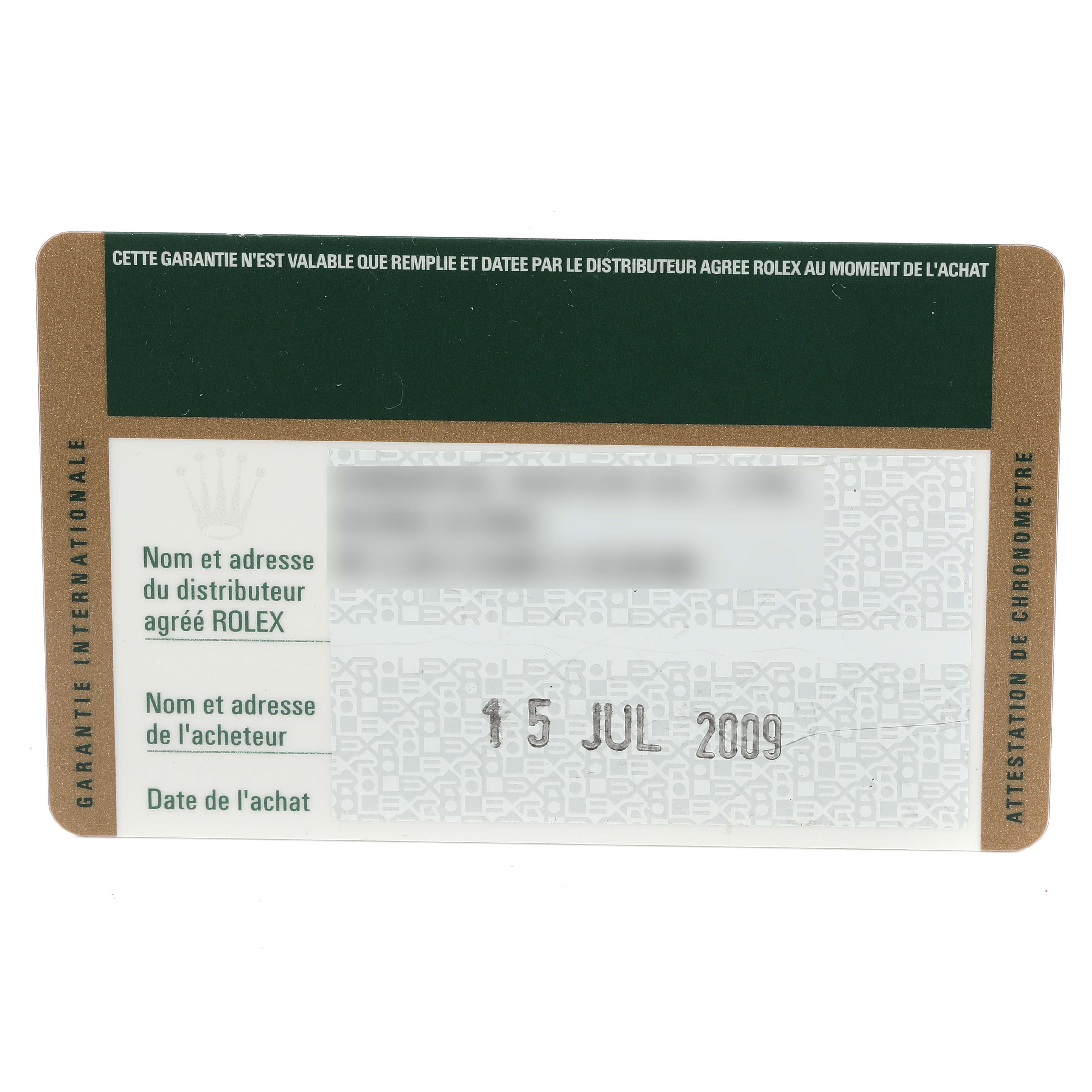 This image shows the warranty card for the Rolex Submariner 16610 Men's Stainless Steel Black Dial 16610 Men's Stainless Steel Black Dial model, featuring purchase date and distributor information.