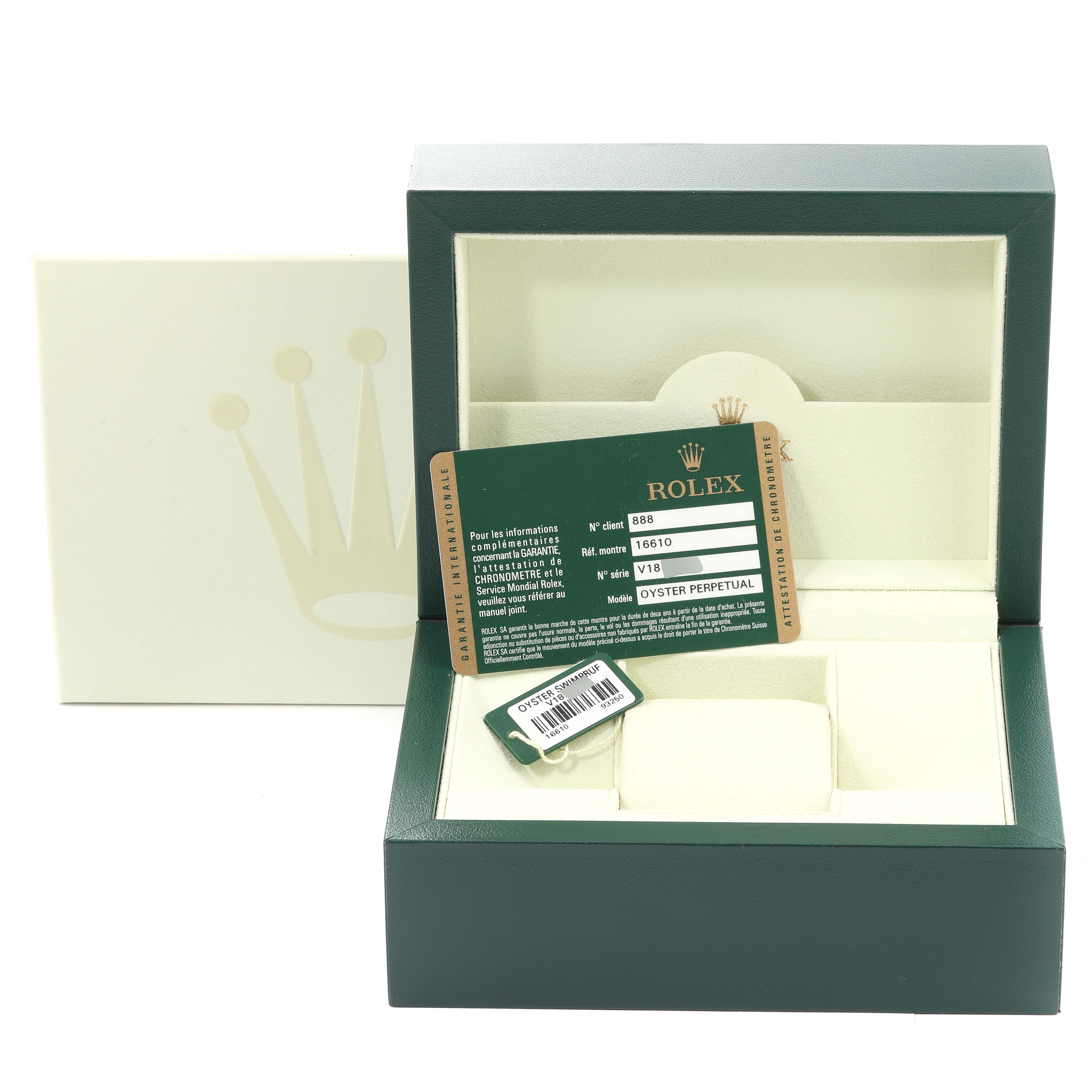 The image shows an open Rolex Submariner 16610 Men's Stainless Steel Black Dial 16610 Men's Stainless Steel Black Dial watch box with a warranty card and tag inside.