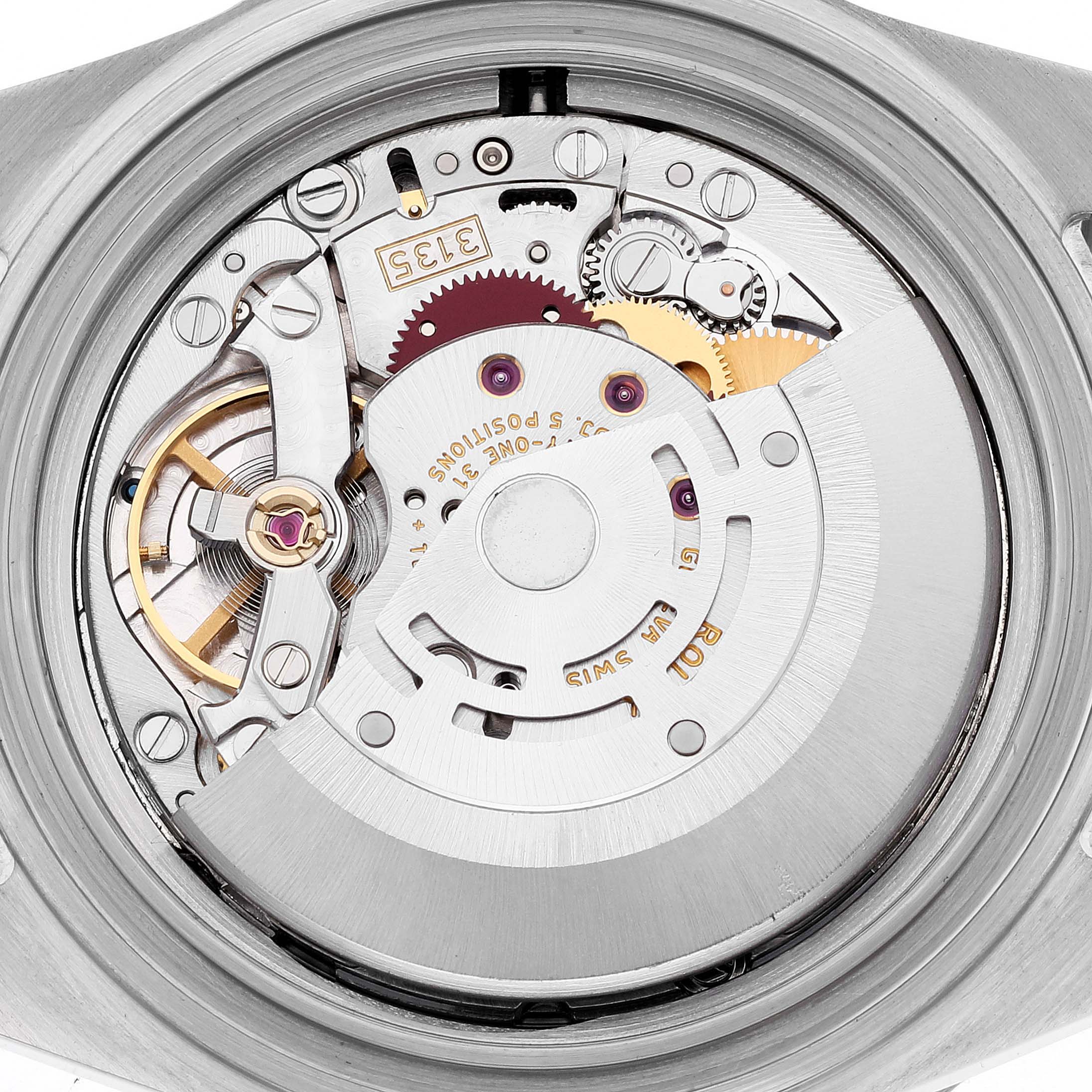 The image shows the internal movement parts of the Rolex Submariner 16613 Men's Steel and Gold (two tone) Blue Dial 16613 Men's Steel and Gold (two tone) Blue Dial watch from a back view angle.