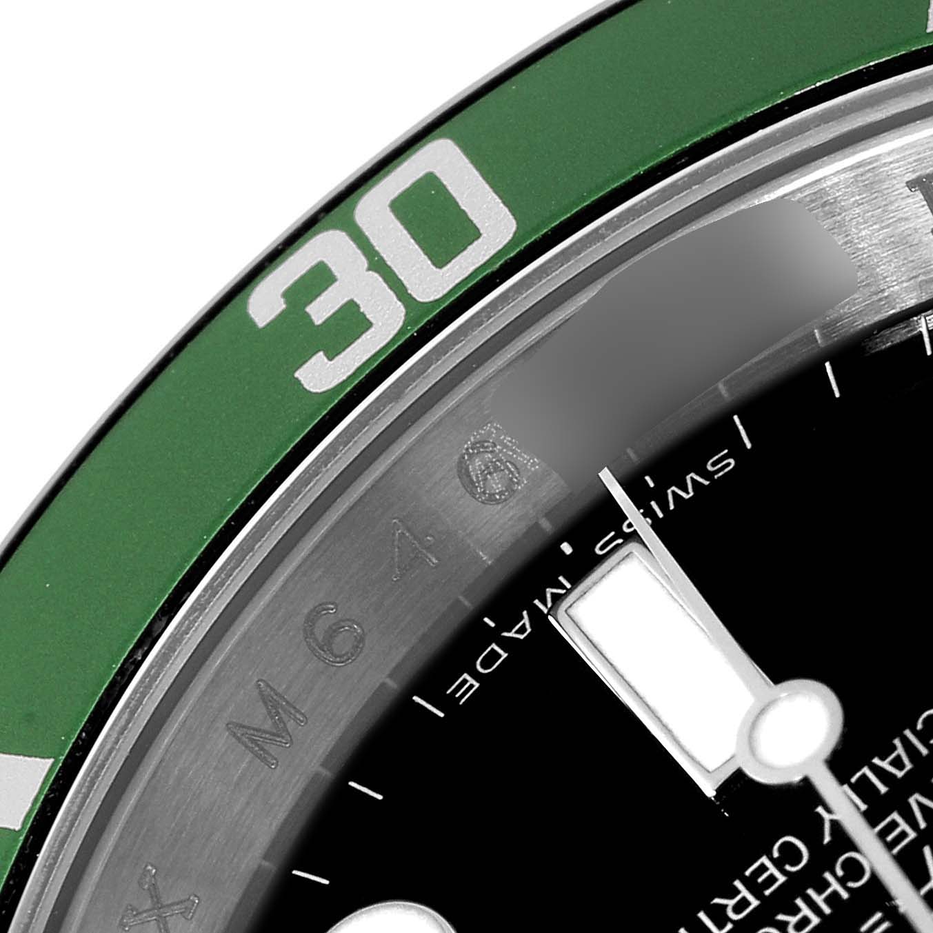 The image is a close-up of the bezel and part of the dial of a Rolex Submariner 16610LV Men's Stainless Steel Black Dial 16610LV Men's Stainless Steel Black Dial watch.