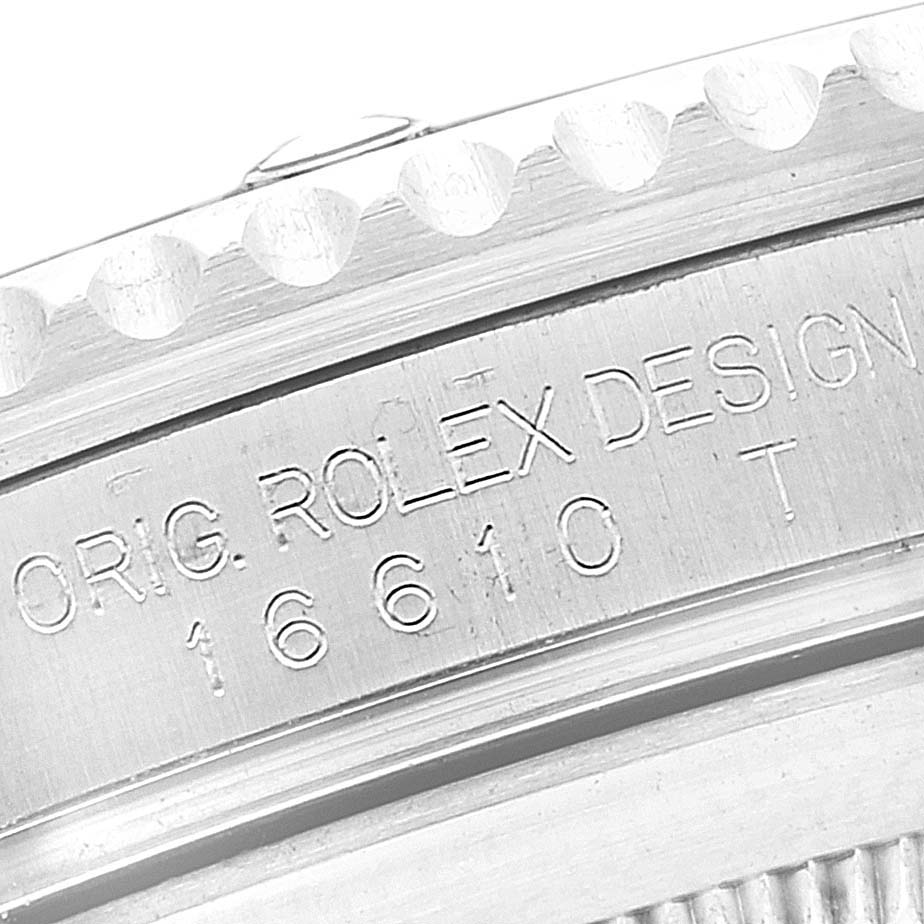 This image shows a close-up of the case back engraving on the Rolex Submariner 16610LV Men's Stainless Steel Black Dial 16610LV Men's Stainless Steel Black Dial model.