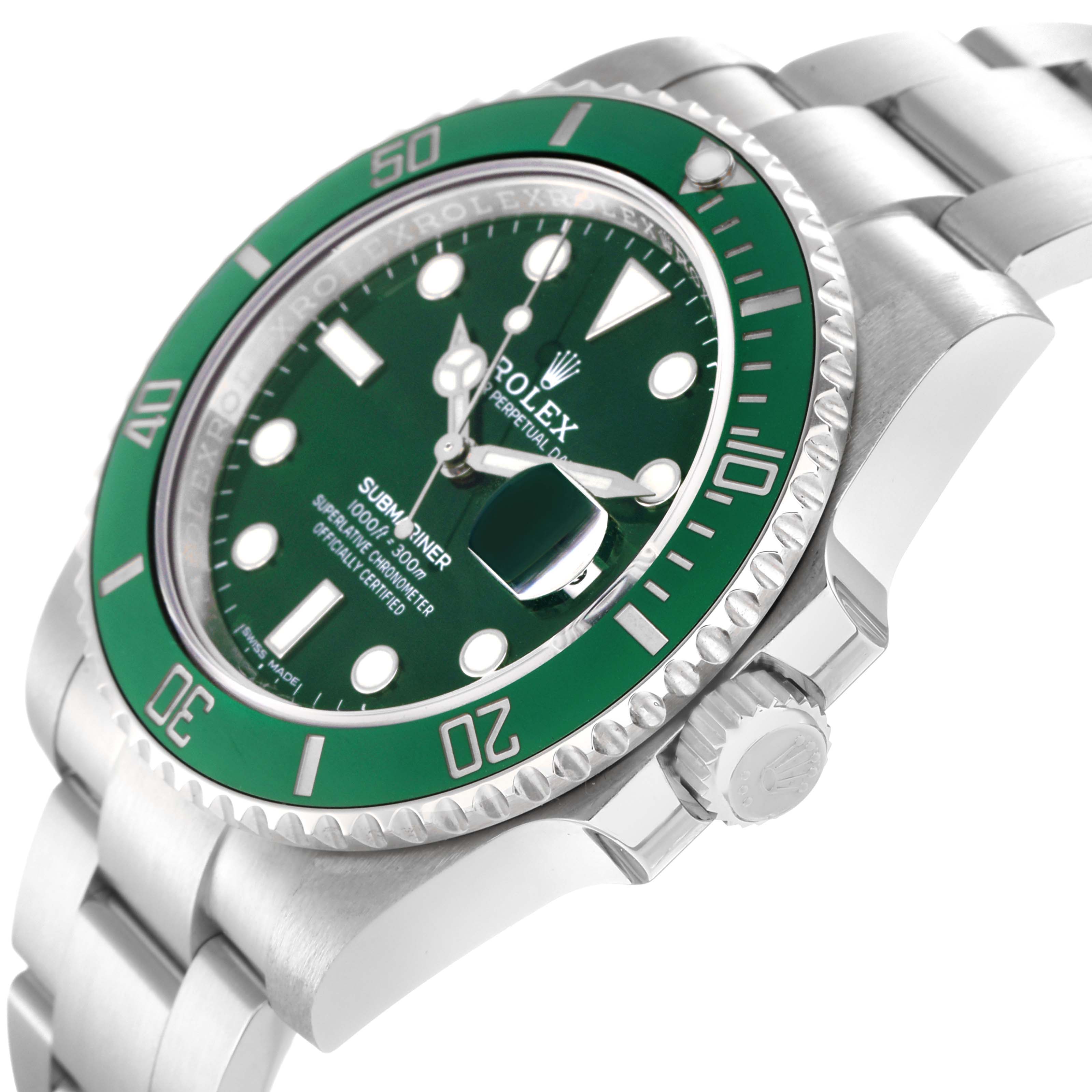 The image shows a Rolex Submariner model 116610LV at an angle highlighting the green dial, bezel, crown, and part of the bracelet.