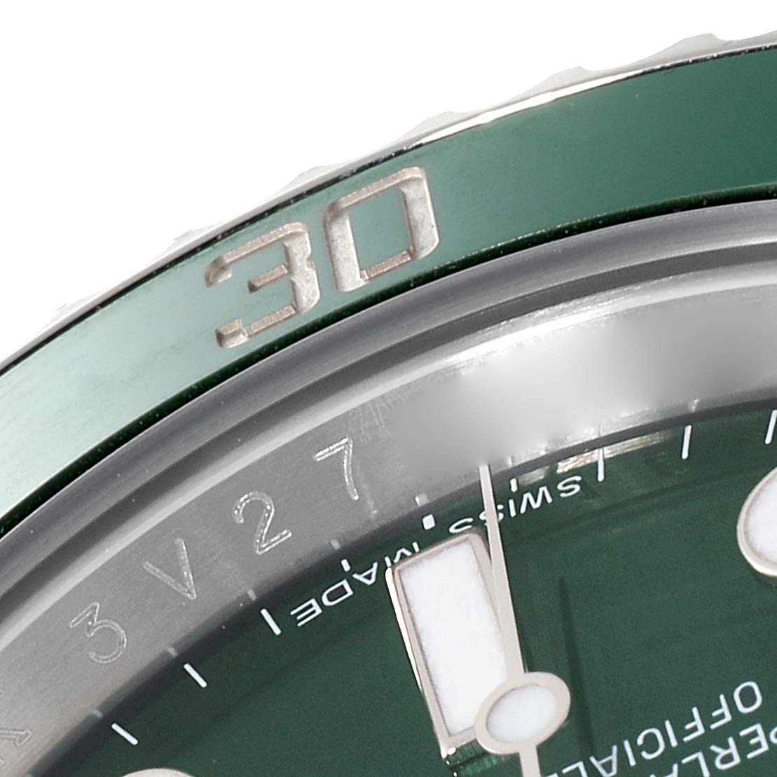 The image shows a close-up of the bezel and dial edge of a Rolex Submariner 116610LV Men
s Stainless Steel Green Dial 116610LV Men
s Stainless Steel Green Dial, focusing on the minute marker and numeral "30" on the bezel.