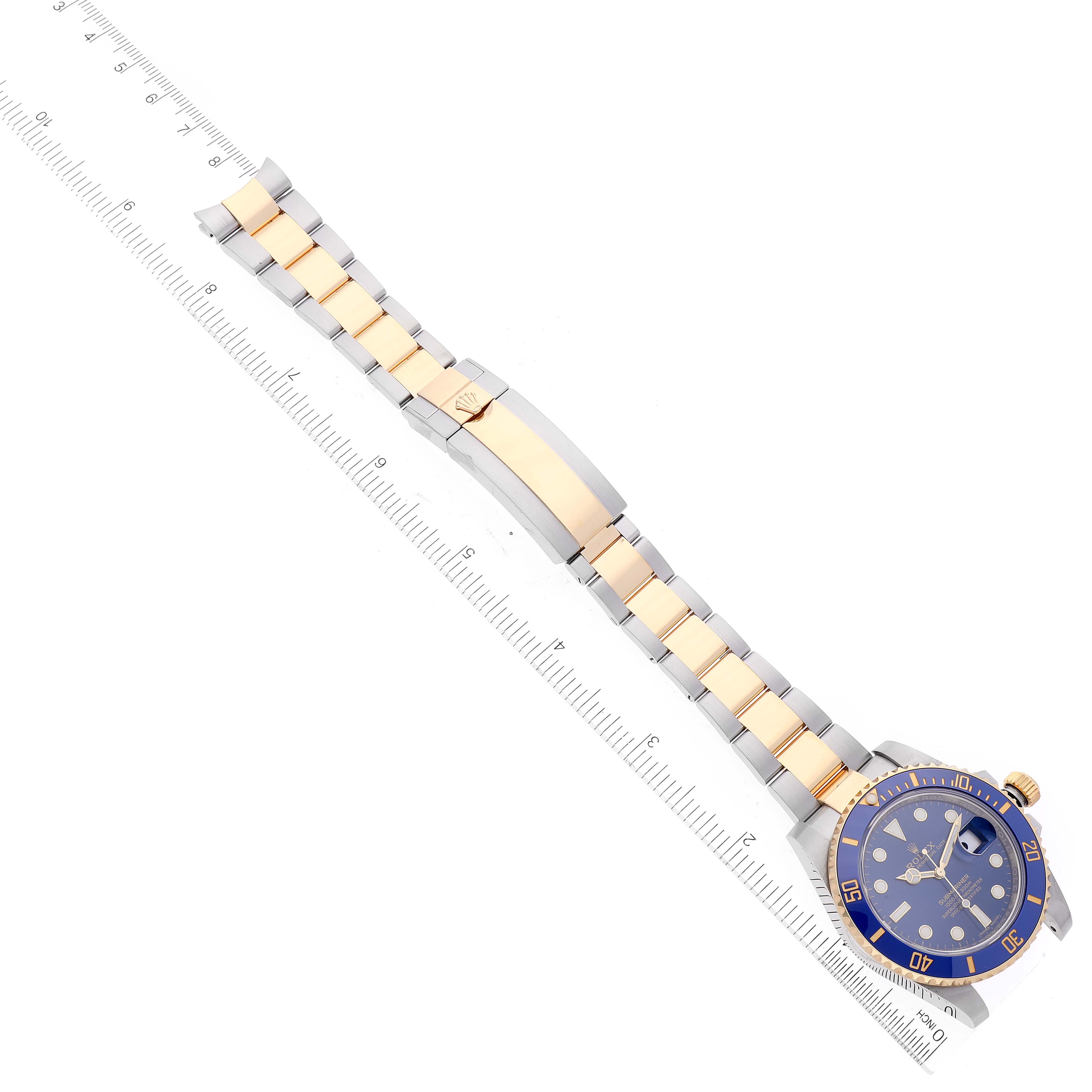 This image shows a top-down view of the Rolex Submariner 116613 Men's Steel and Gold (two tone) Blue Dial 116613 Men's Steel and Gold (two tone) Blue Dial watch, including its face, bezel, and bracelet with ruler markings.