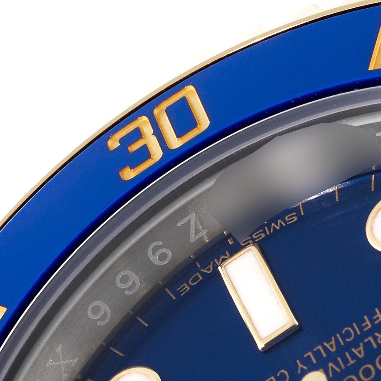 The image shows a close-up of the bezel and dial of a Rolex Submariner 116613 Men's Steel and Gold (two tone) Blue Dial 116613 Men's Steel and Gold (two tone) Blue Dial watch, highlighting the "30" minute marker.