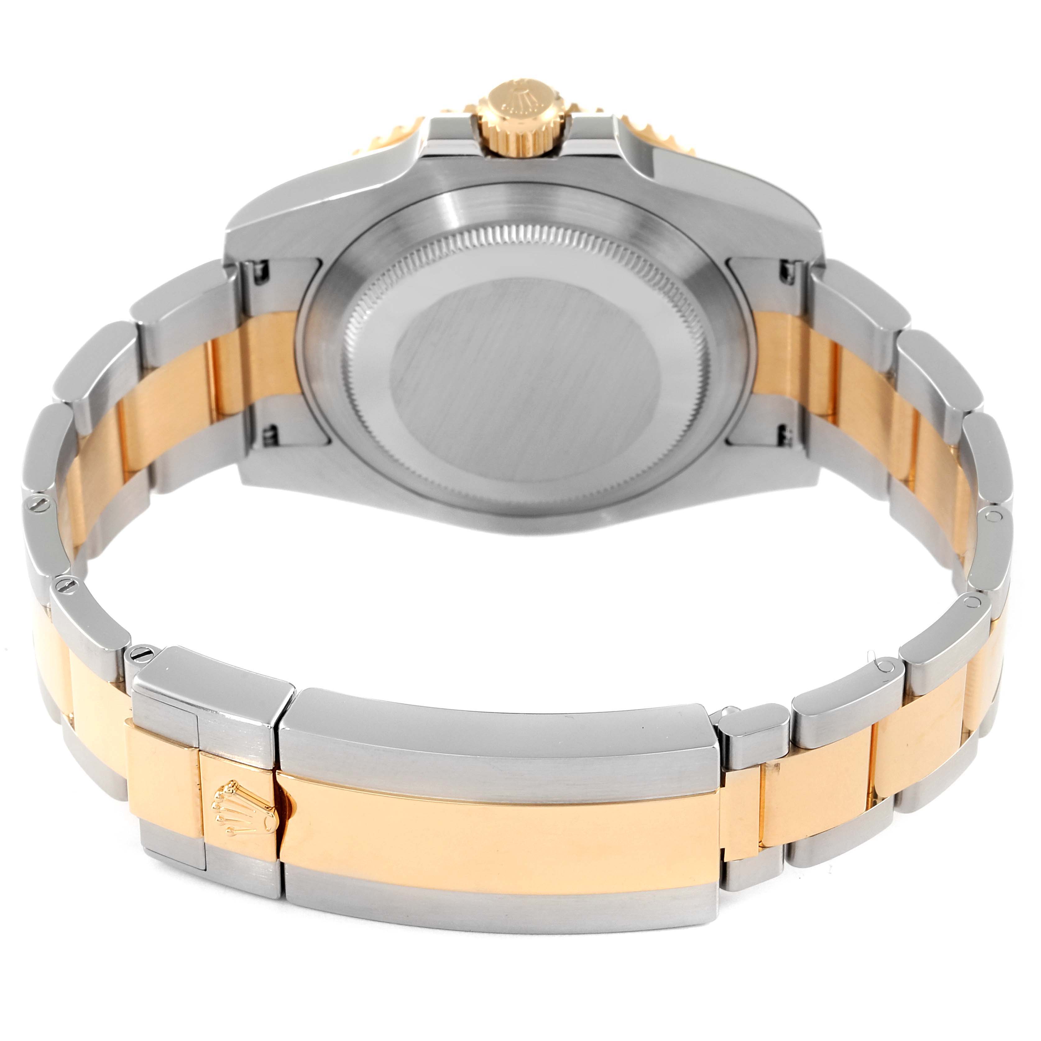 The image shows the backside and bracelet of a Rolex Submariner 116613 Men's Steel and Gold (two tone) Blue Dial 116613 Men's Steel and Gold (two tone) Blue Dial watch, highlighting the case back and clasp.