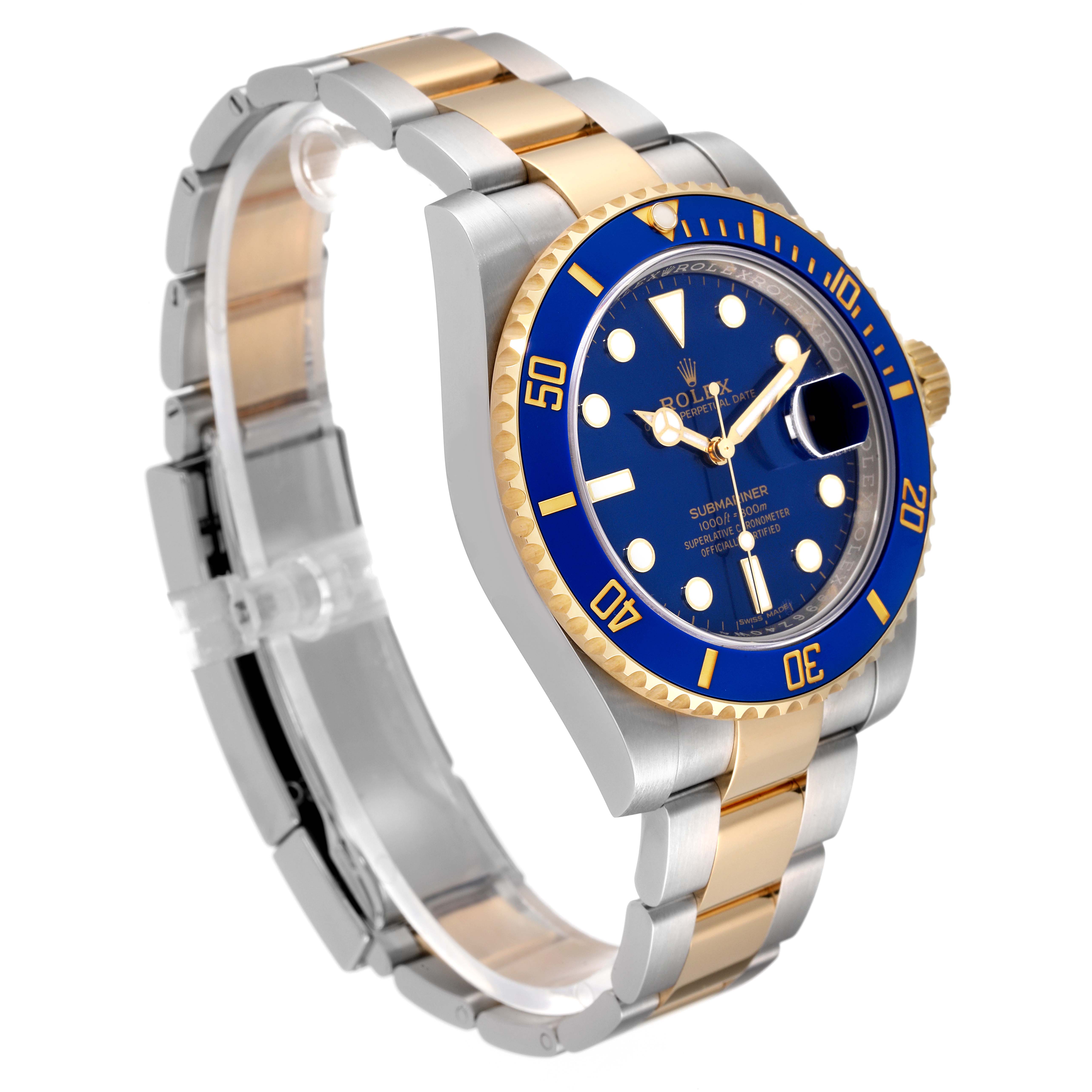 This image shows a side and slightly angled view of a Rolex Submariner 116613 Men's Steel and Gold (two tone) Blue Dial 116613 Men's Steel and Gold (two tone) Blue Dial watch, showcasing its blue dial, bezel, and two-tone bracelet.