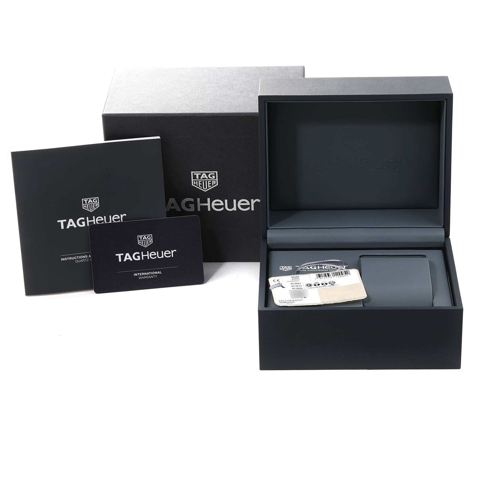 The image shows the packaging, including the box, guidelines, and warranty card for the Tag Heuer Aquaracer CAY111B Men's Stainless Steel Blue Dial CAY111B Men's Stainless Steel Blue Dial watch.