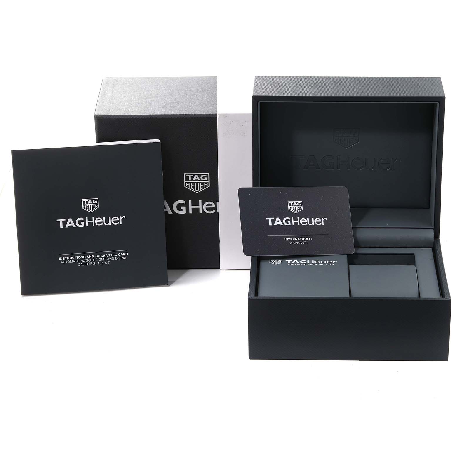 The image shows the packaging, warranty card, and instruction booklet for the Tag Heuer Aquaracer WBP201C Men's Stainless Steel Silver Dial WBP201C Men's Stainless Steel Silver Dial watch.