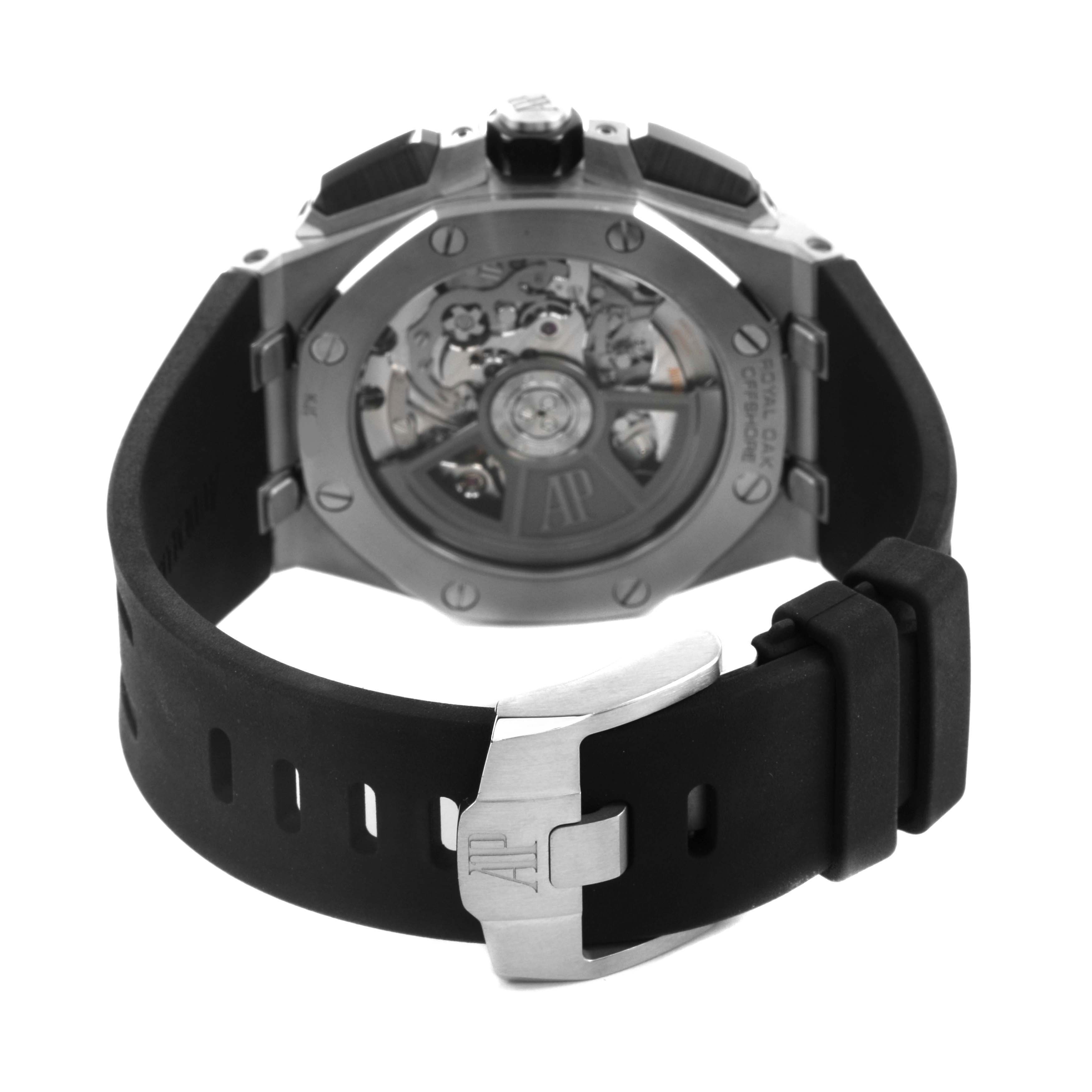 The Audemars Piguet Royal Oak Offshore 26420SO.OO.A002CA.01 Men's Stainless Steel Black Dial watch is shown from the back, highlighting the visible movement and the clasp on the strap.