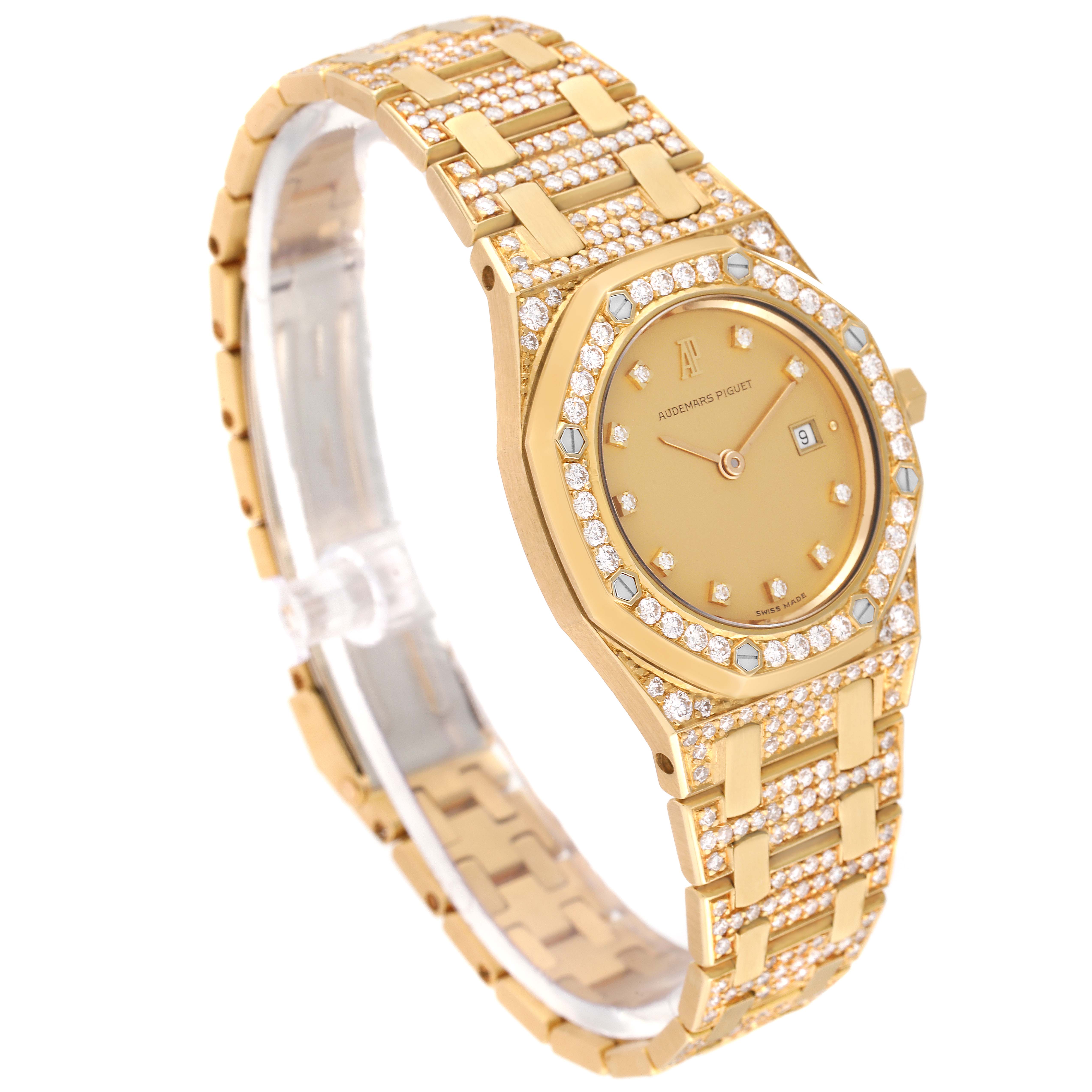 This is a side-angle view of an Audemars Piguet Royal Oak Women's Yellow Gold Champagne Dial Women's Yellow Gold Champagne Dial watch, highlighting the gold case, diamond-studded bezel, and bracelet.