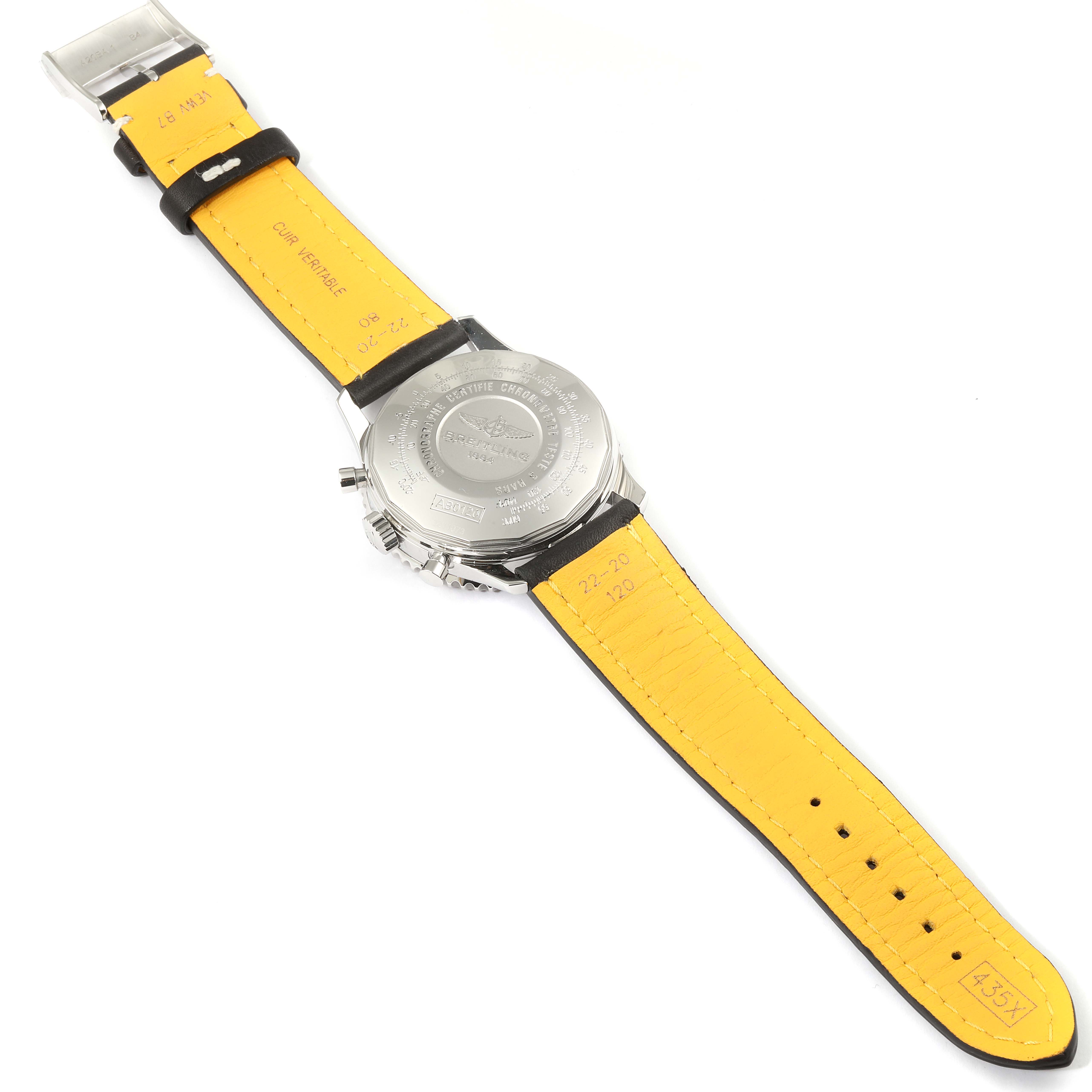 The image shows the back case and yellow leather strap of a Breitling Navitimer AB0120 Men
s Stainless Steel Black Dial AB0120 Men
s Stainless Steel Black Dial watch.