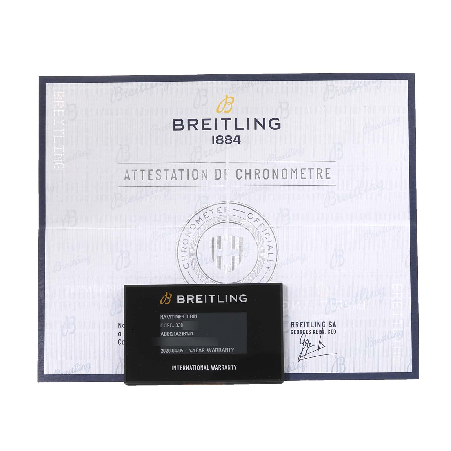 The image shows the official Breitling Navitimer AB0121A21B1A1 Men's Stainless Steel Grey Dial AB0121A21B1A1 Men's Stainless Steel Grey Dial documentation and warranty card shot from a top-down angle.