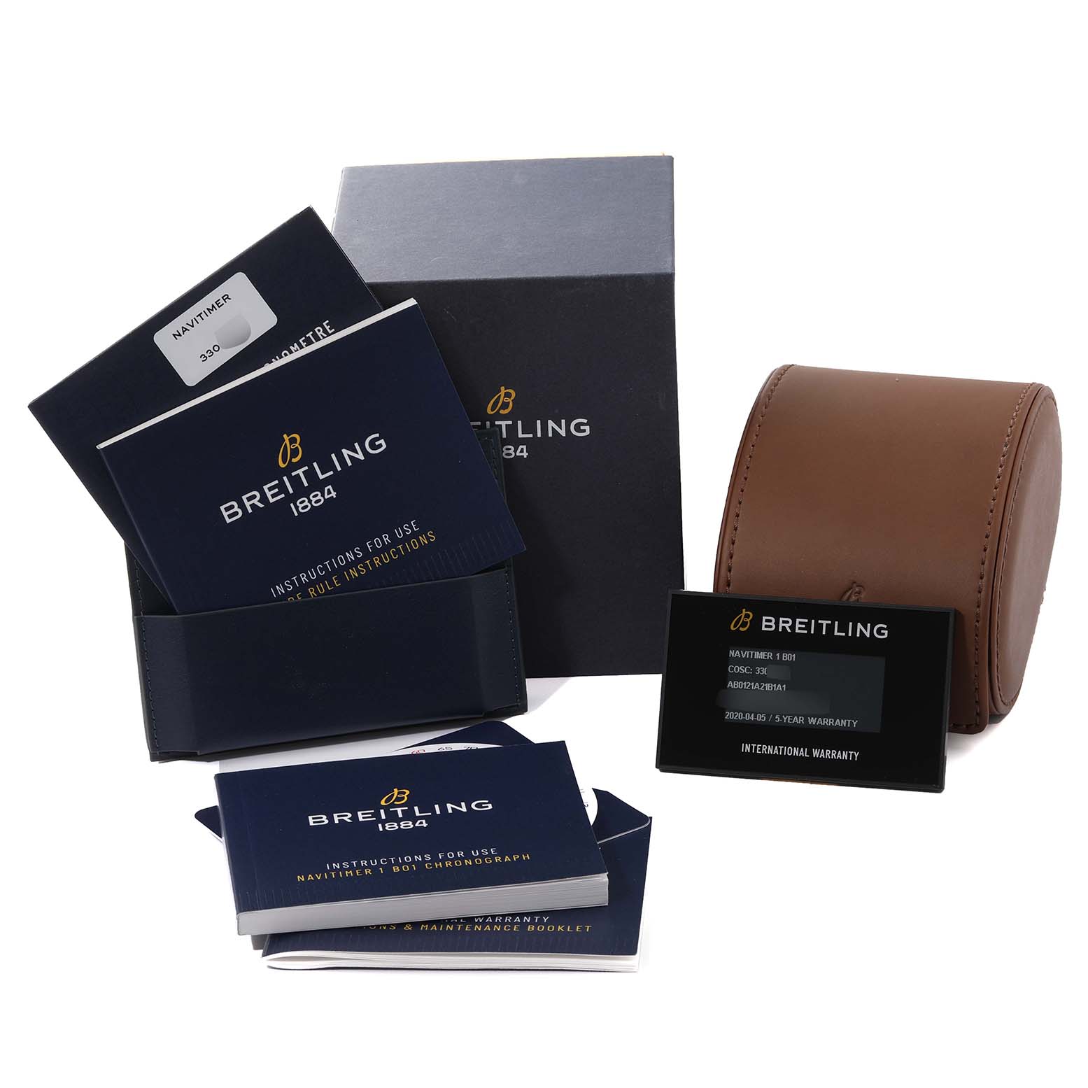 The image shows the packaging, instruction manuals, and warranty cards for a Breitling Navitimer AB0121A21B1A1 Men's Stainless Steel Grey Dial AB0121A21B1A1 Men's Stainless Steel Grey Dial watch.