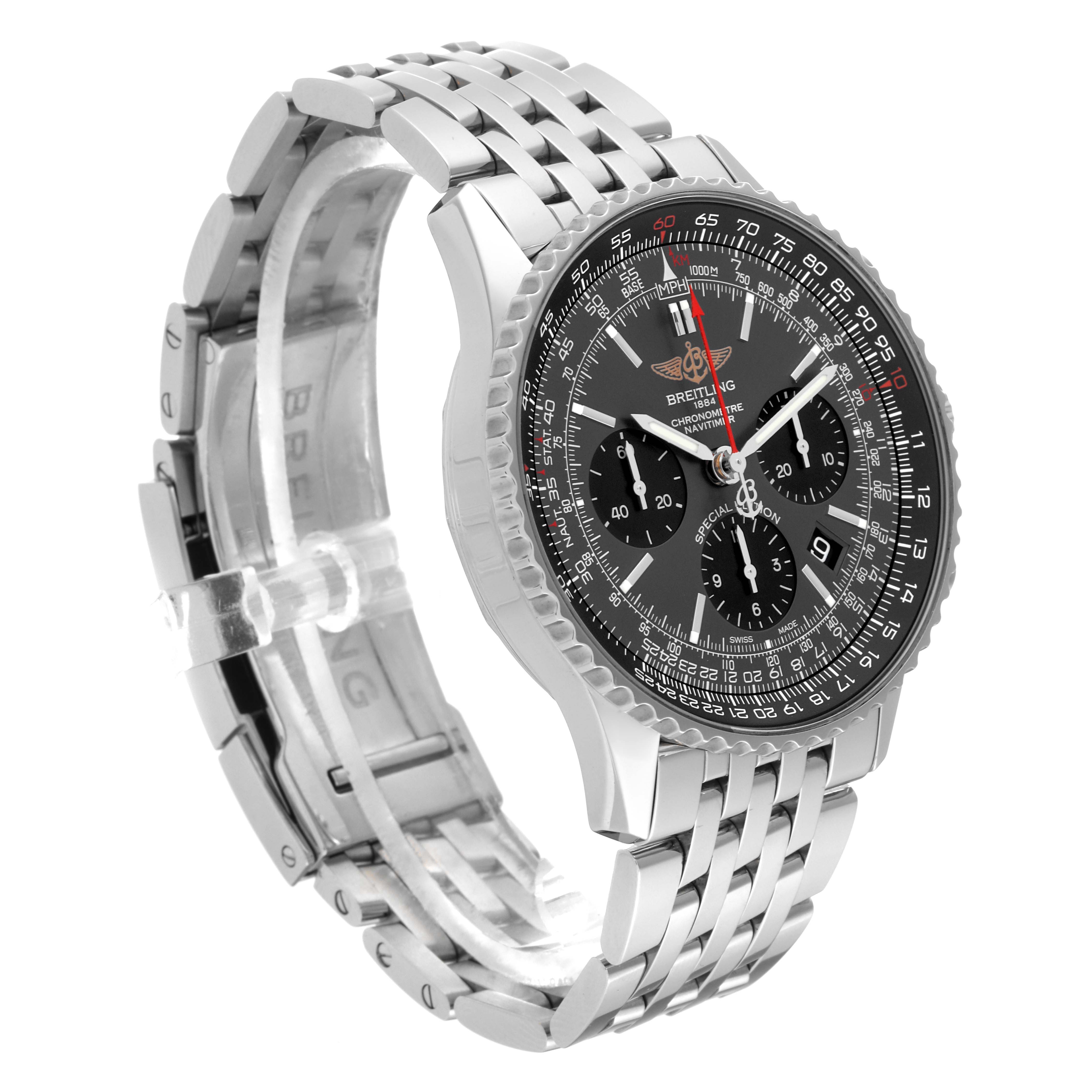 This Navitimer by Breitling is shown from a three-quarter angle, displaying its dial, bezel, and metal bracelet.