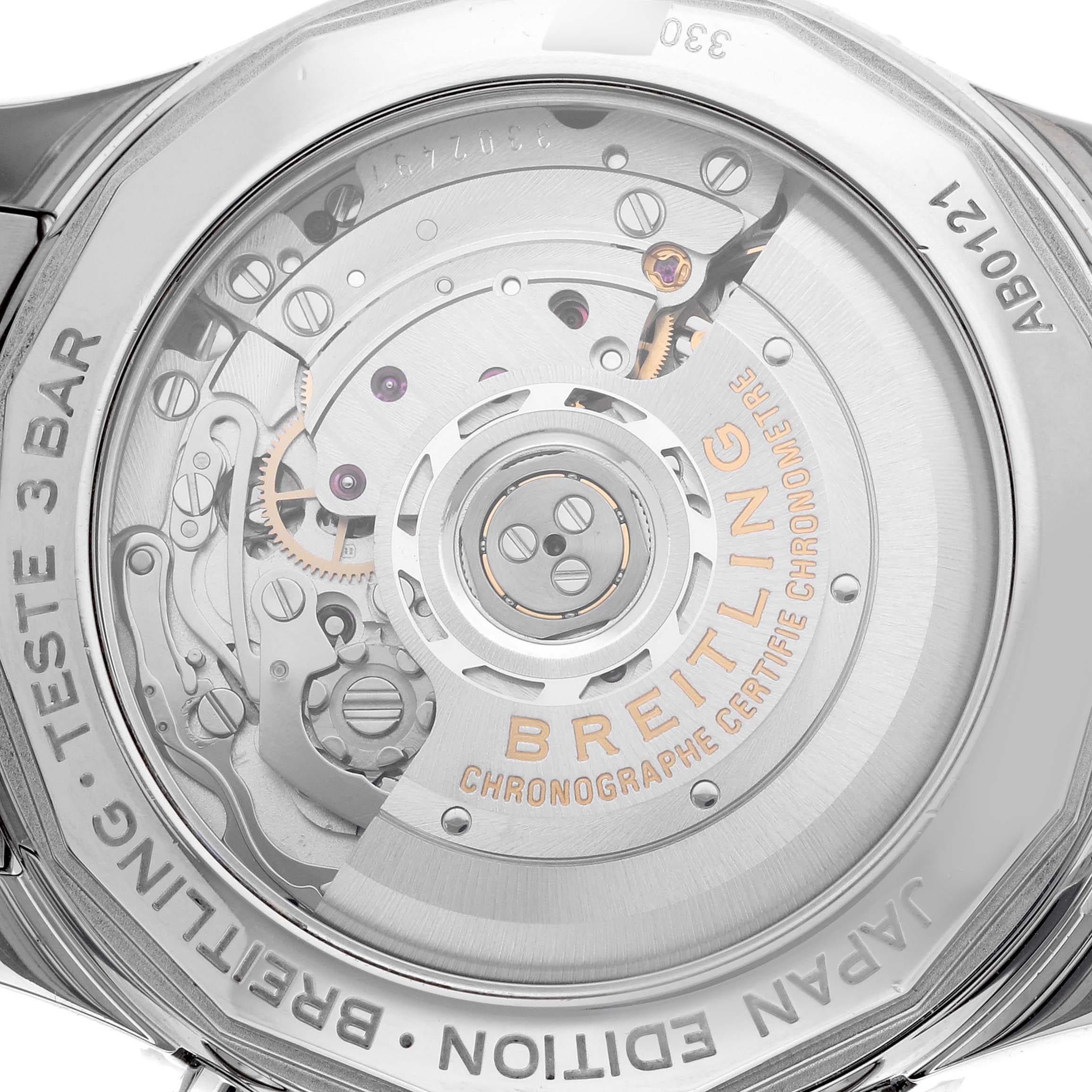 The image shows the back of the Breitling Navitimer AB0121A21B1A1 Men's Stainless Steel Grey Dial AB0121A21B1A1 Men's Stainless Steel Grey Dial, revealing its mechanical movement and internal components.