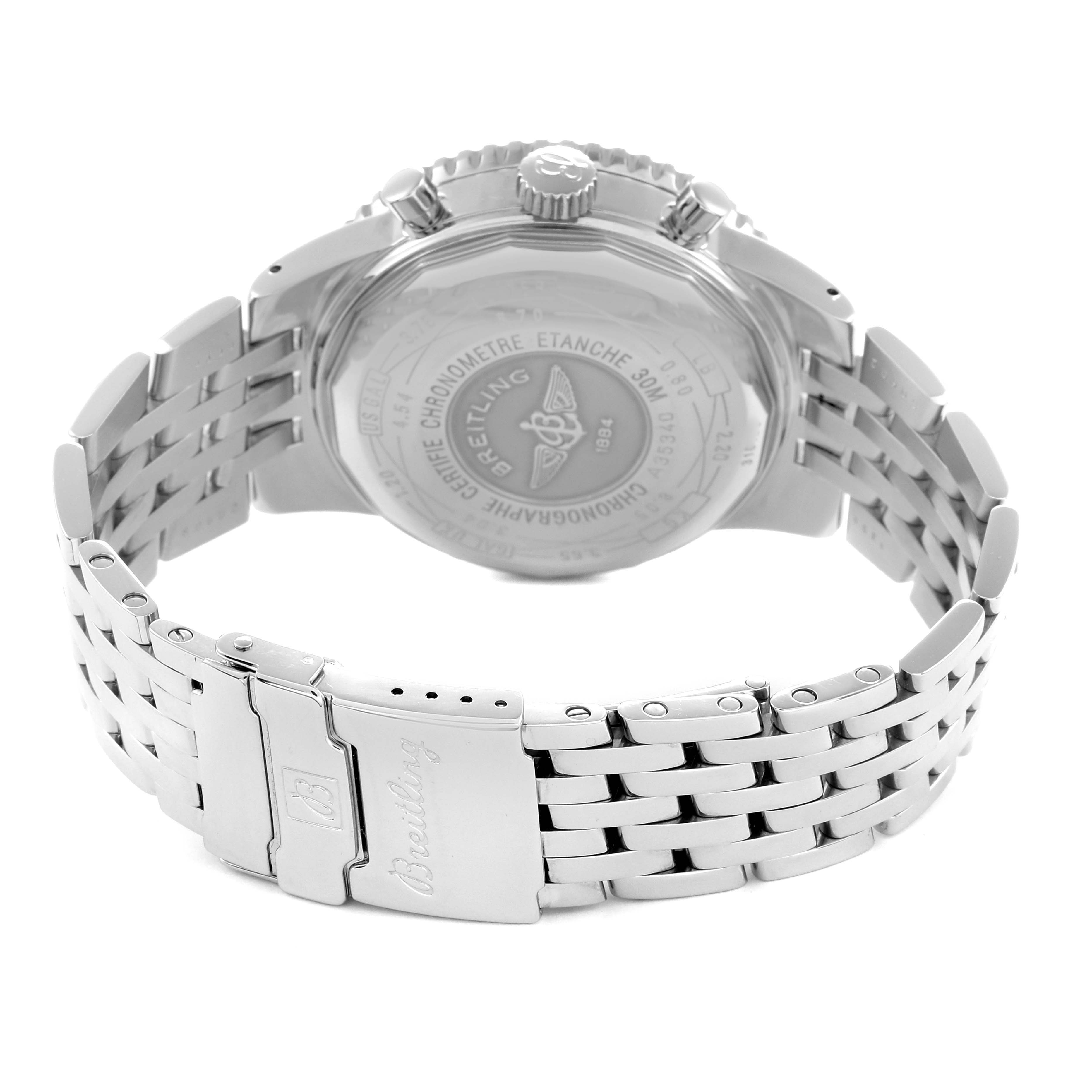 The image shows the back view of a Breitling Navitimer model A35340 men's watch, highlighting the case back, crown, pushers, and metal bracelet with the clasp.