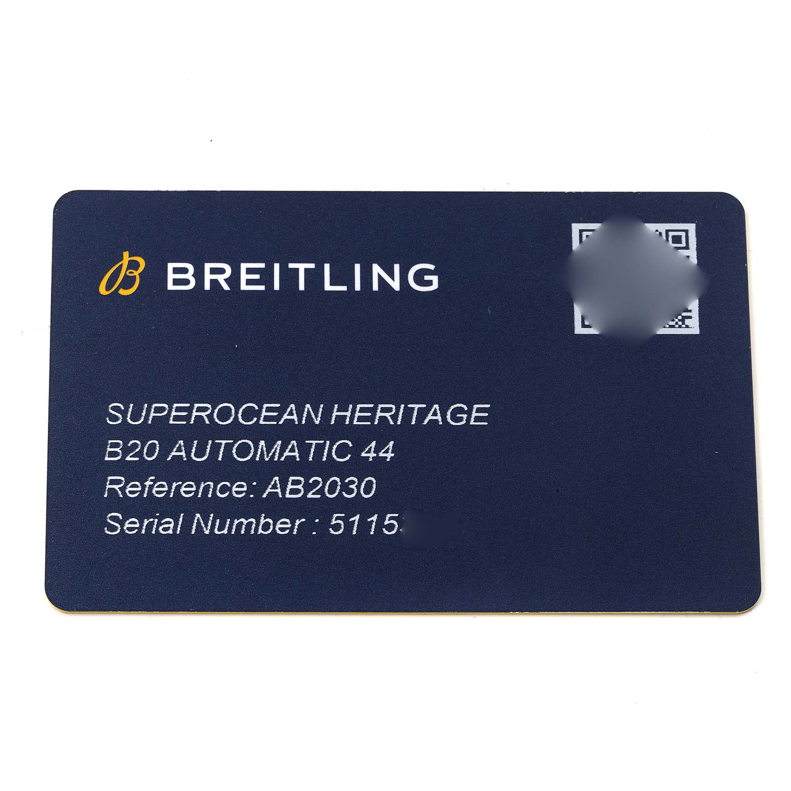 The image shows a close-up of a warranty card for a Breitling Superocean Heritage B20 Automatic 44 with reference number AB2030.