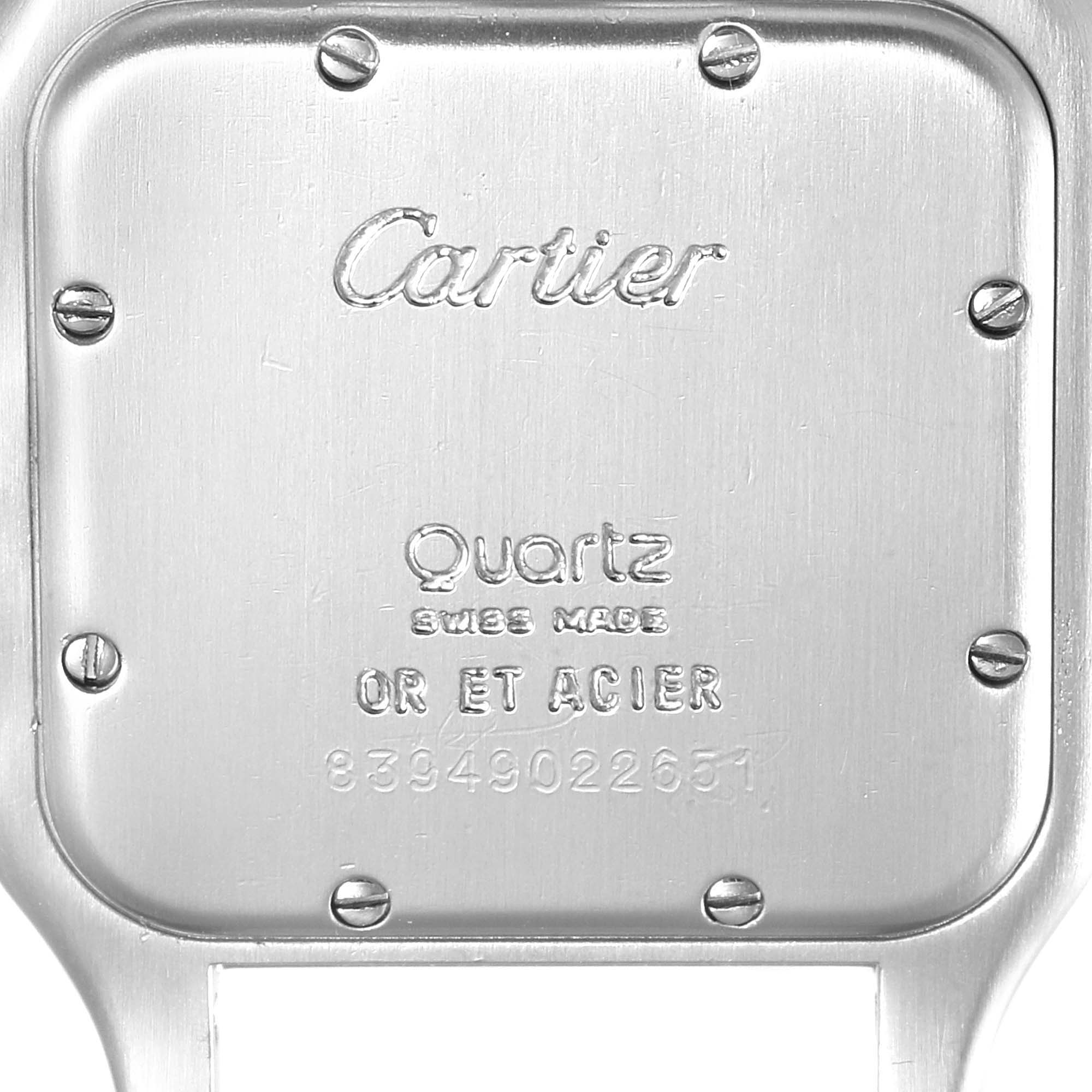 This image shows the case back of a Cartier Panthere W25028B6 Men's Steel and Gold (two tone) Silver Dial W25028B6 Men's Steel and Gold (two tone) Silver Dial model watch, showcasing the brand inscription and specifications.