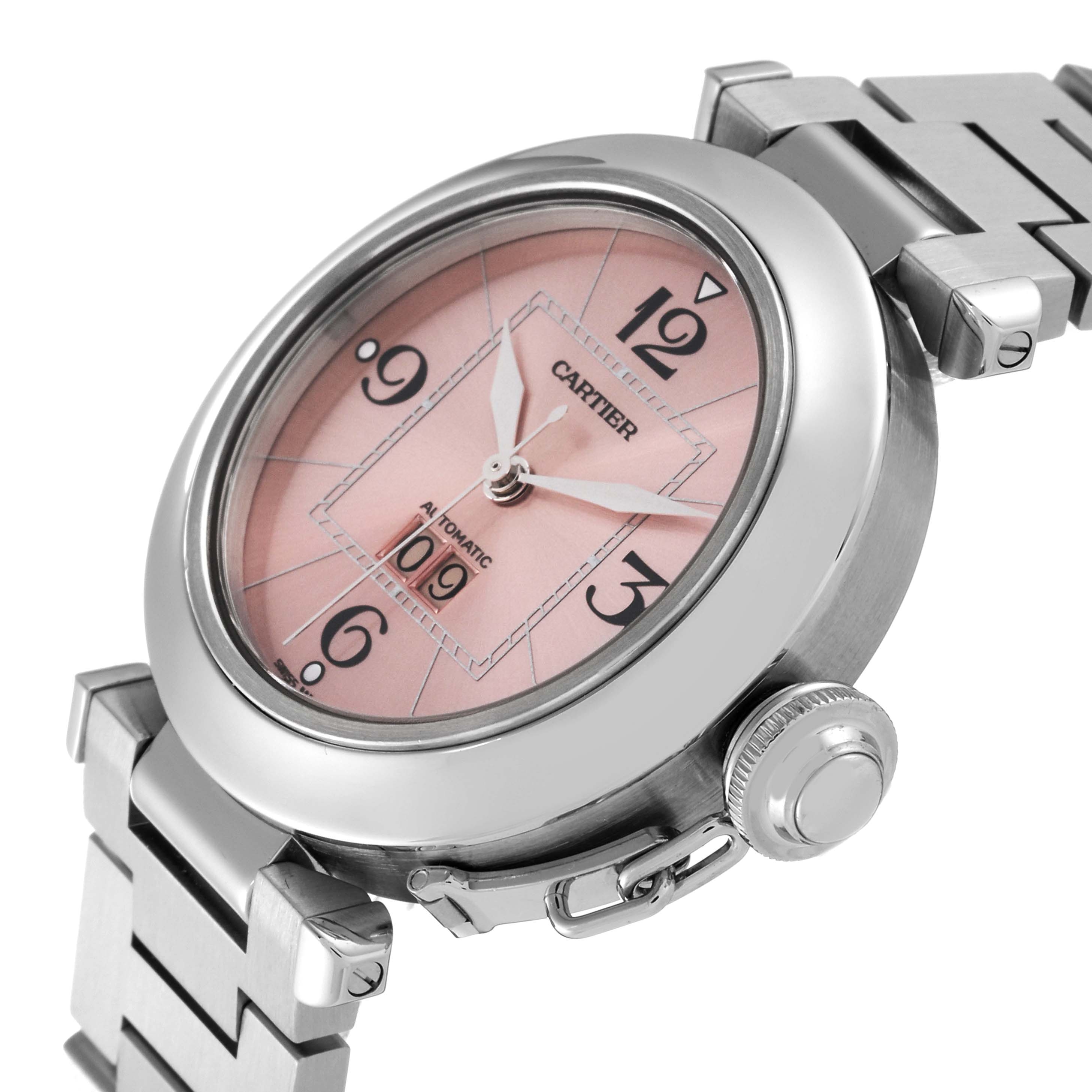 The image shows a Cartier Pasha W31058M7 Women's Stainless Steel Pink Dial W31058M7 Women's Stainless Steel Pink Dial watch, angled to display the pink dial, crown, and part of the metal bracelet.