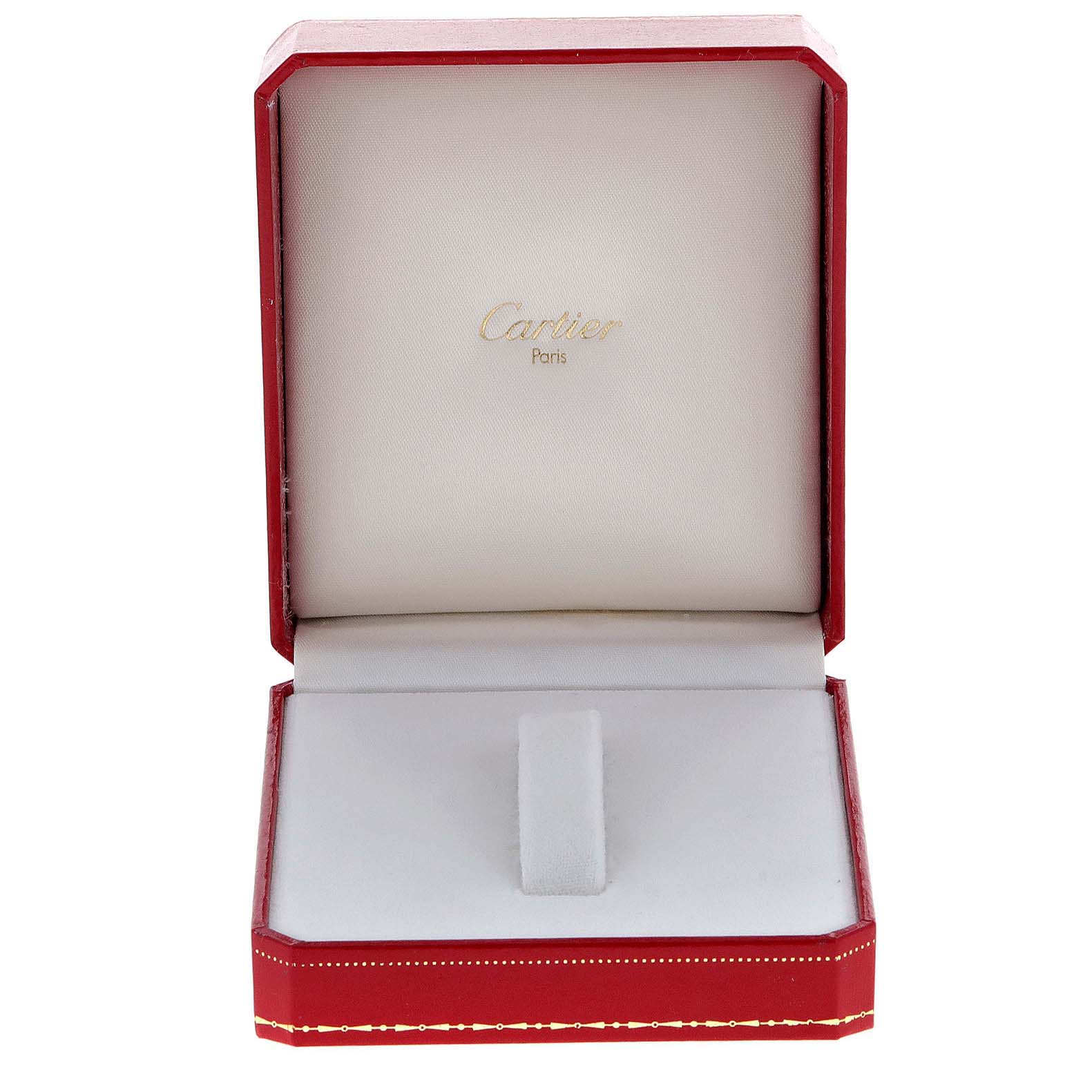 The image shows an open red Cartier box with white interior, designed to hold the Santos Demoiselle model watch.