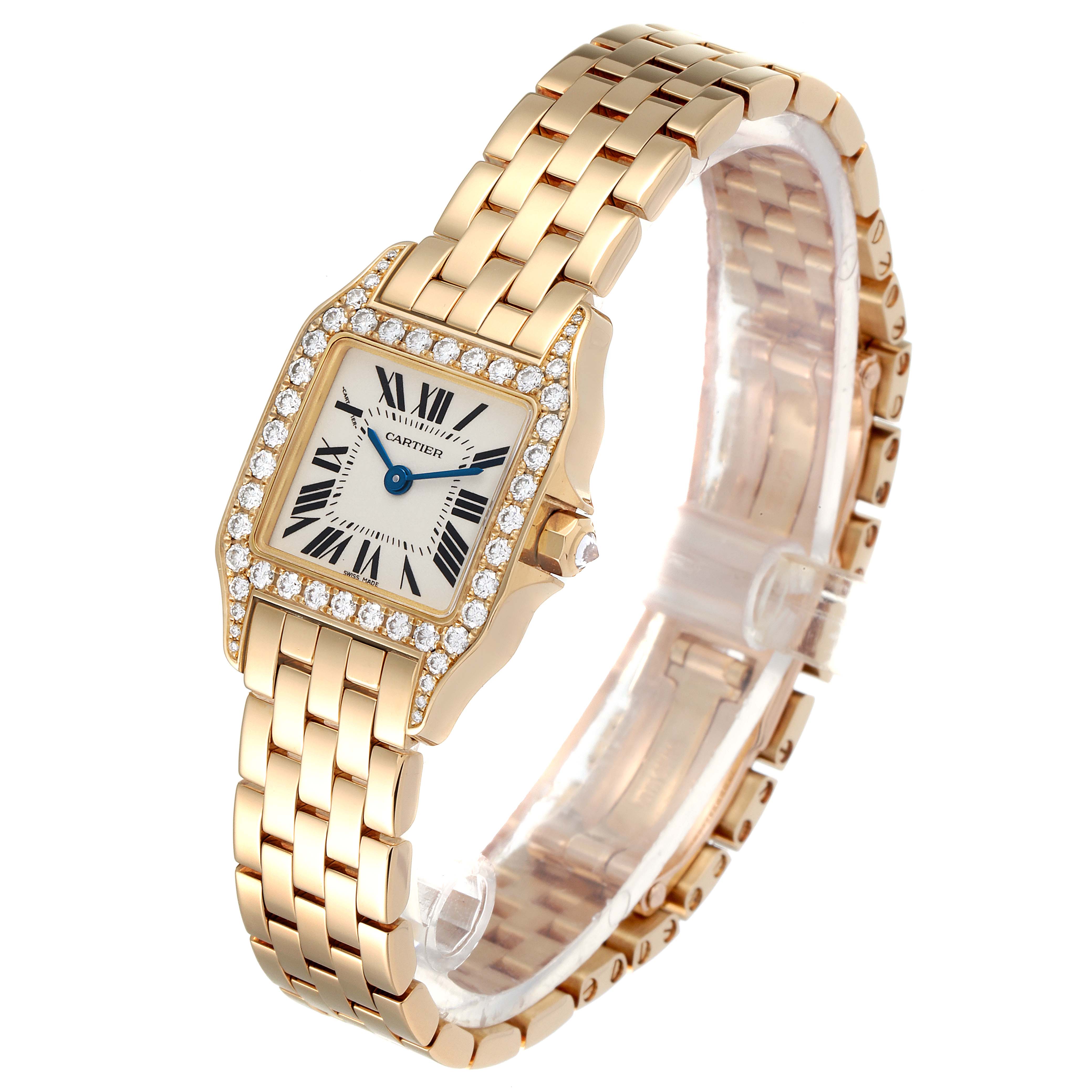 The Cartier Santos Demoiselle WF9001Y7 Women
s Yellow Gold Silver Dial WF9001Y7 Women
s Yellow Gold Silver Dial watch is shown at a three-quarter angle, revealing its face, bezel, and bracelet.