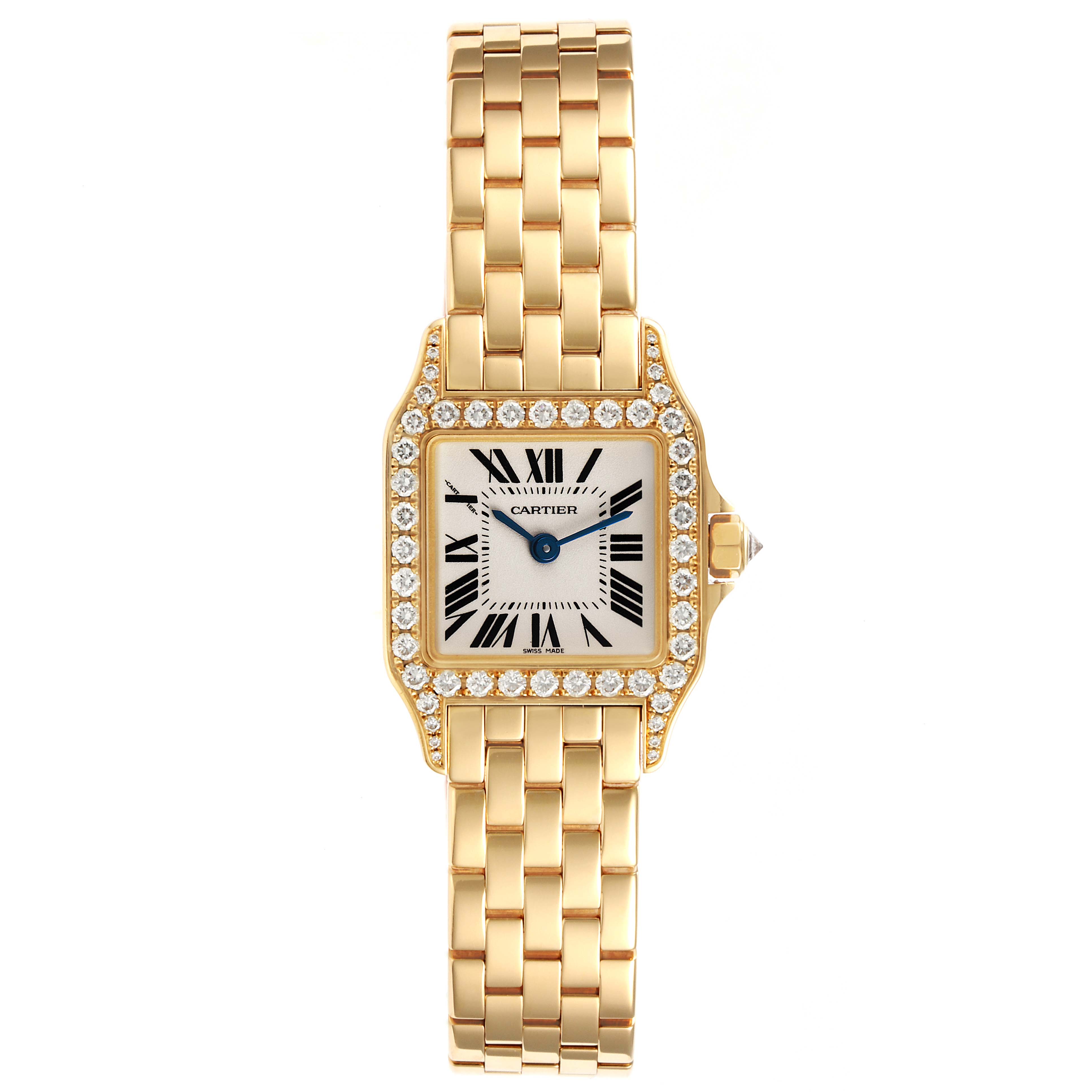 The image shows a front view of the Cartier Santos Demoiselle WF9001Y7 Women
s Yellow Gold Silver Dial WF9001Y7 Women
s Yellow Gold Silver Dial watch, featuring its gold bracelet and diamond-encrusted bezel.