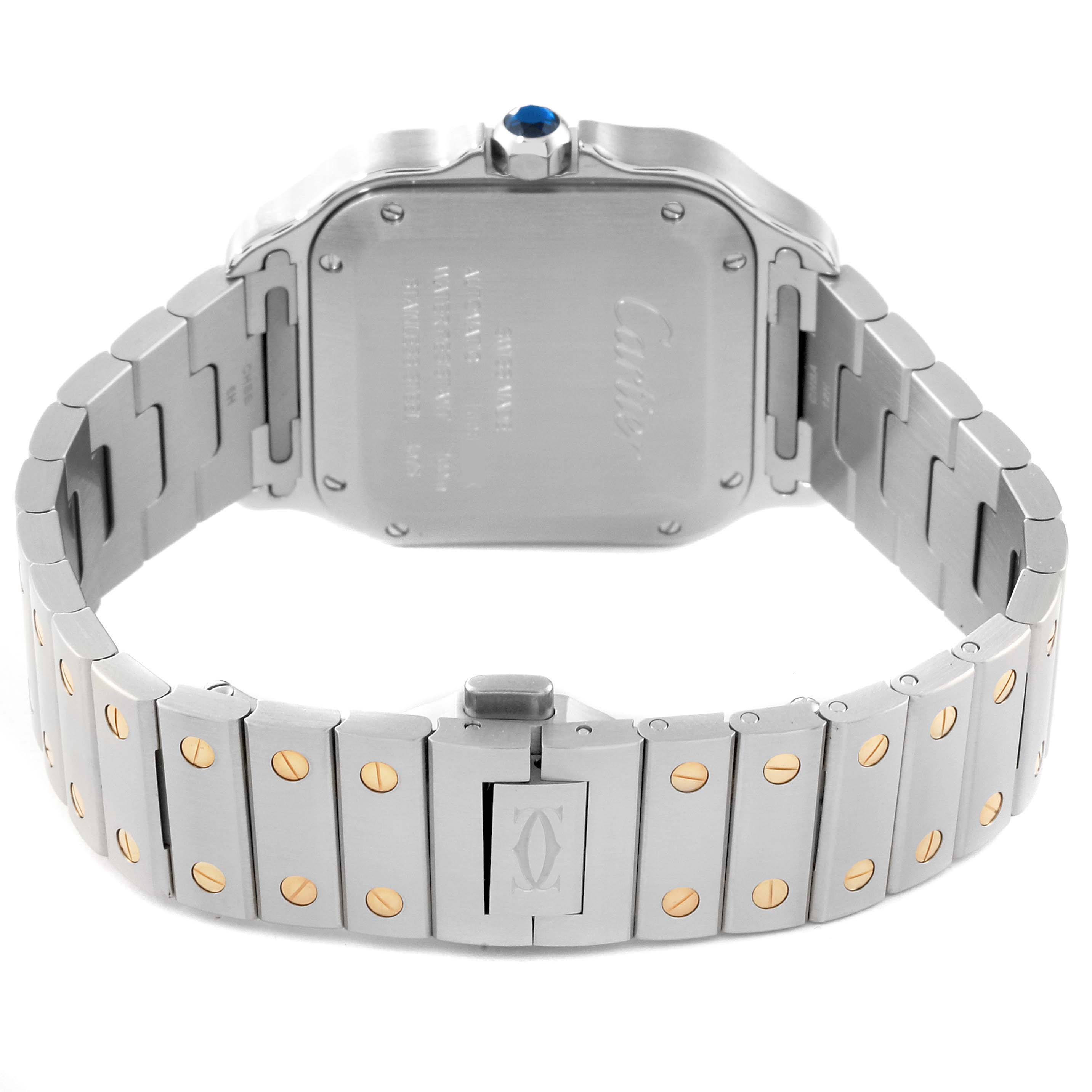 The image shows the back view of a Cartier Santos W2SA0016 Men
s Steel and Gold (two tone) Silver Dial W2SA0016 Men
s Steel and Gold (two tone) Silver Dial watch, featuring its stainless steel case, bracelet, and blue cabochon crown.