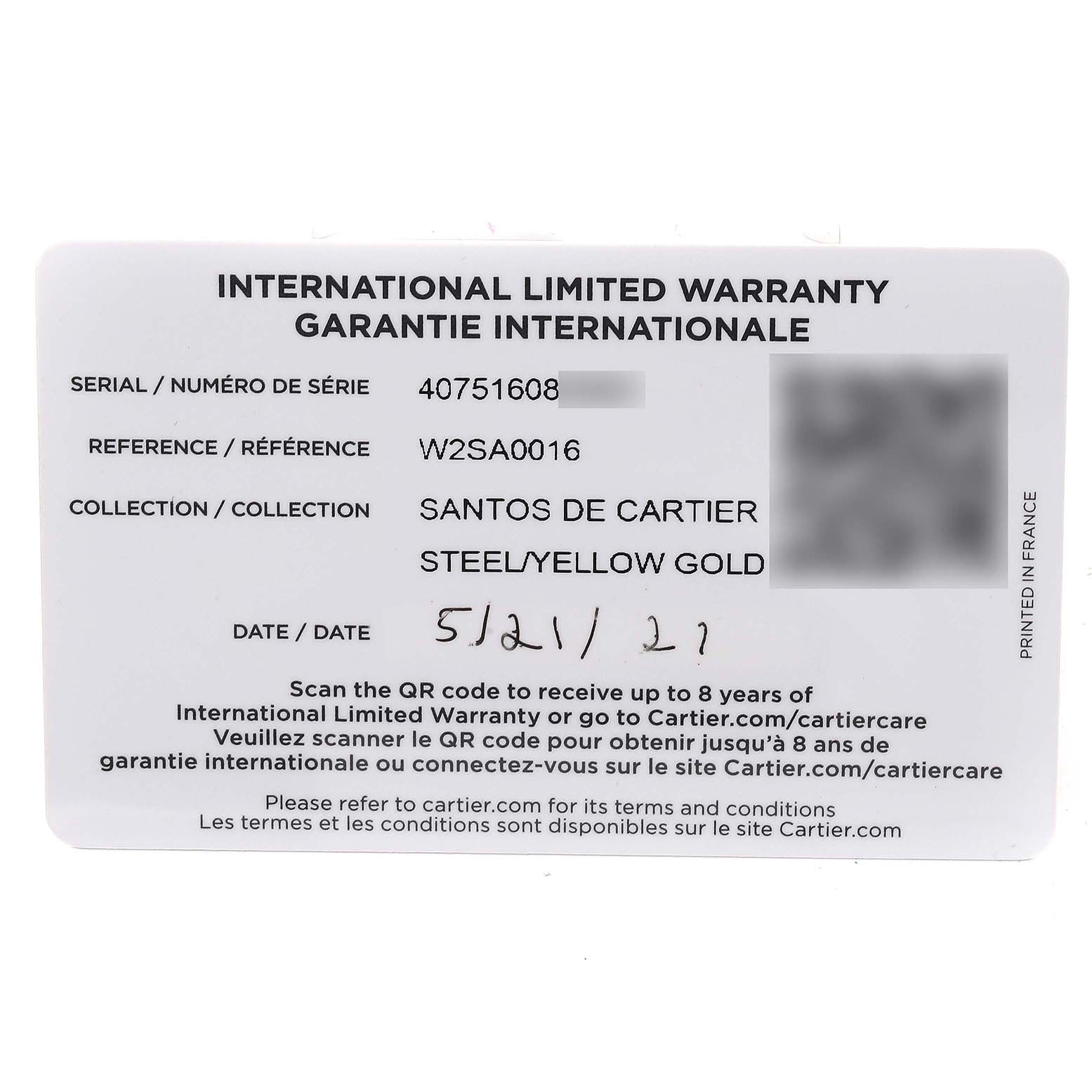 This is the international limited warranty card for the Cartier Santos W2SA0016 Men
s Steel and Gold (two tone) Silver Dial W2SA0016 Men
s Steel and Gold (two tone) Silver Dial model, showing serial, reference, and purchase date details.