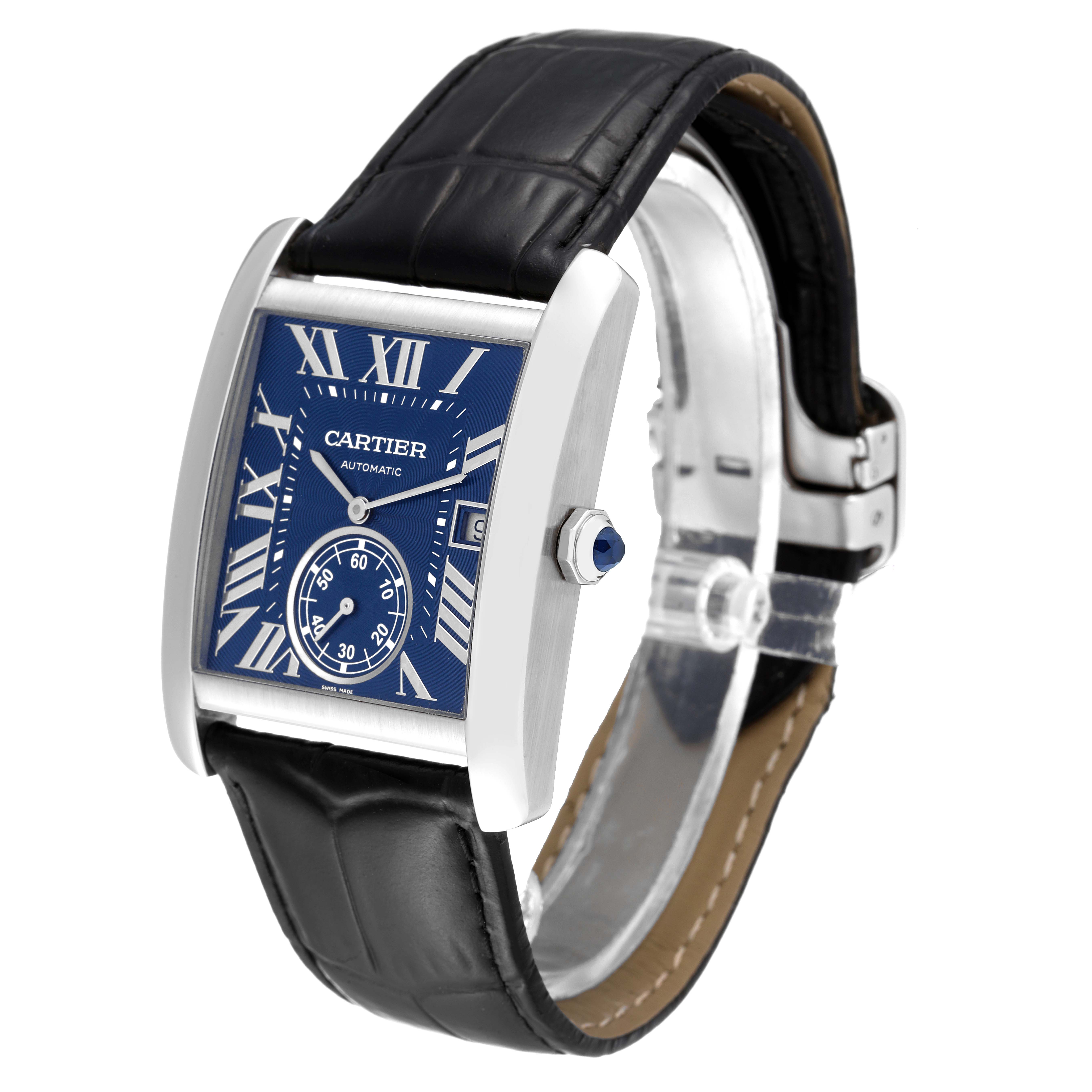 The image shows a Cartier Tank MC WSTA0010 Men
s Stainless Steel Blue Dial WSTA0010 Men
s Stainless Steel Blue Dial watch from a front angle, highlighting its blue dial, Roman numerals, and black leather strap.