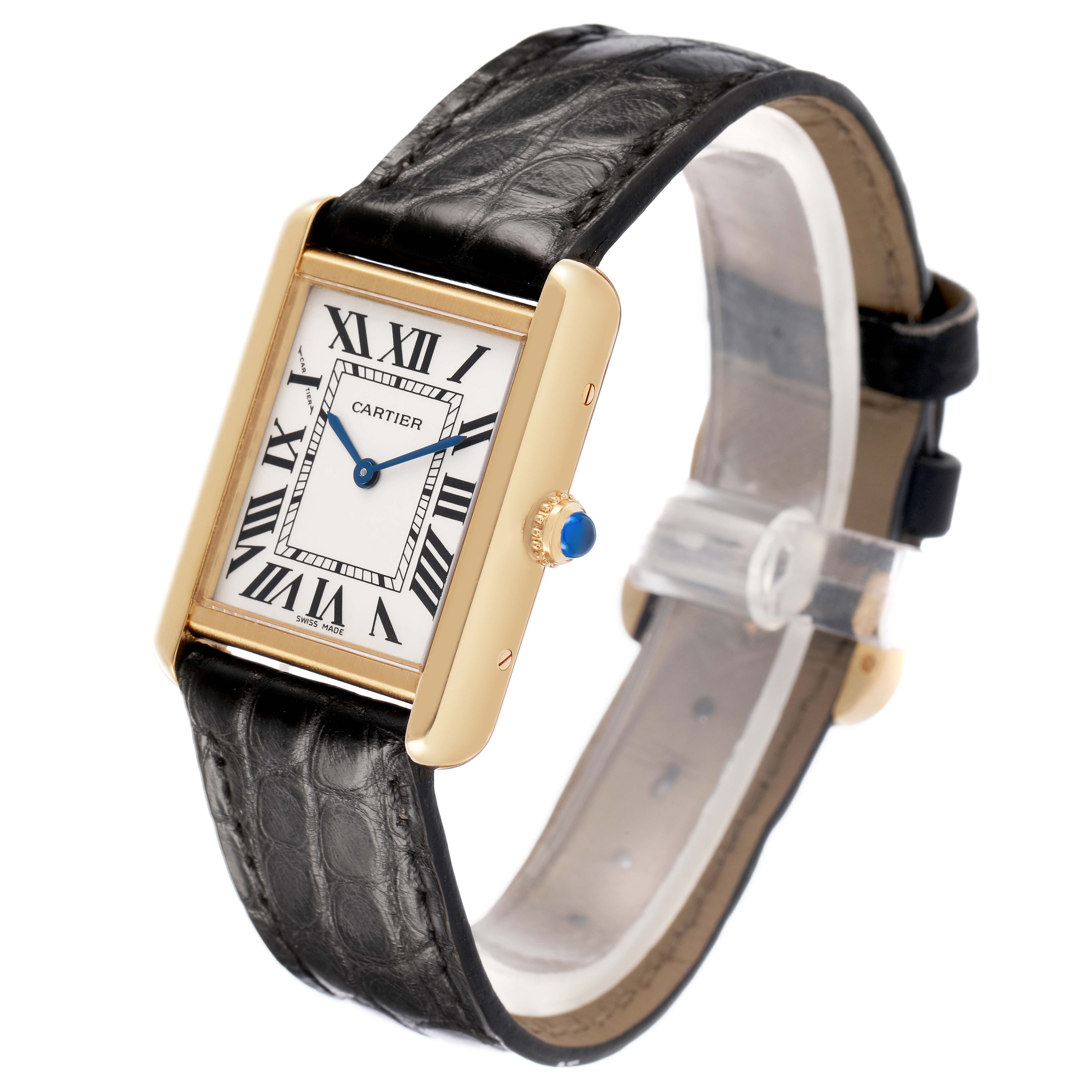 The Cartier Tank Solo W1018755 Women's Yellow Gold Silver Dial watch is shown at an angled view, displaying its rectangular face, Roman numerals, and leather strap.