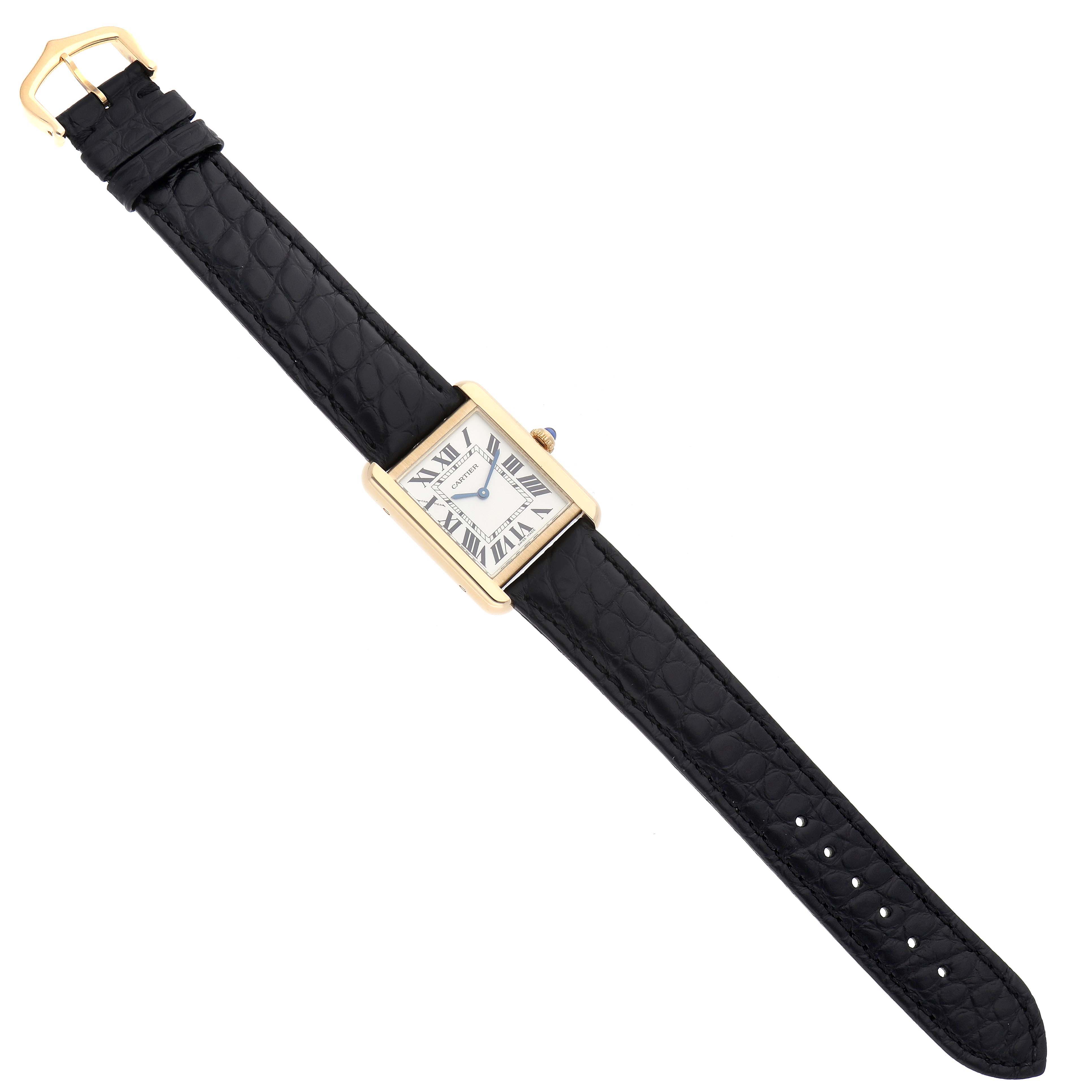 The Cartier Tank Solo model number W5200002 is shown from a top-down angle, displaying the full face, case, and entire black leather strap.