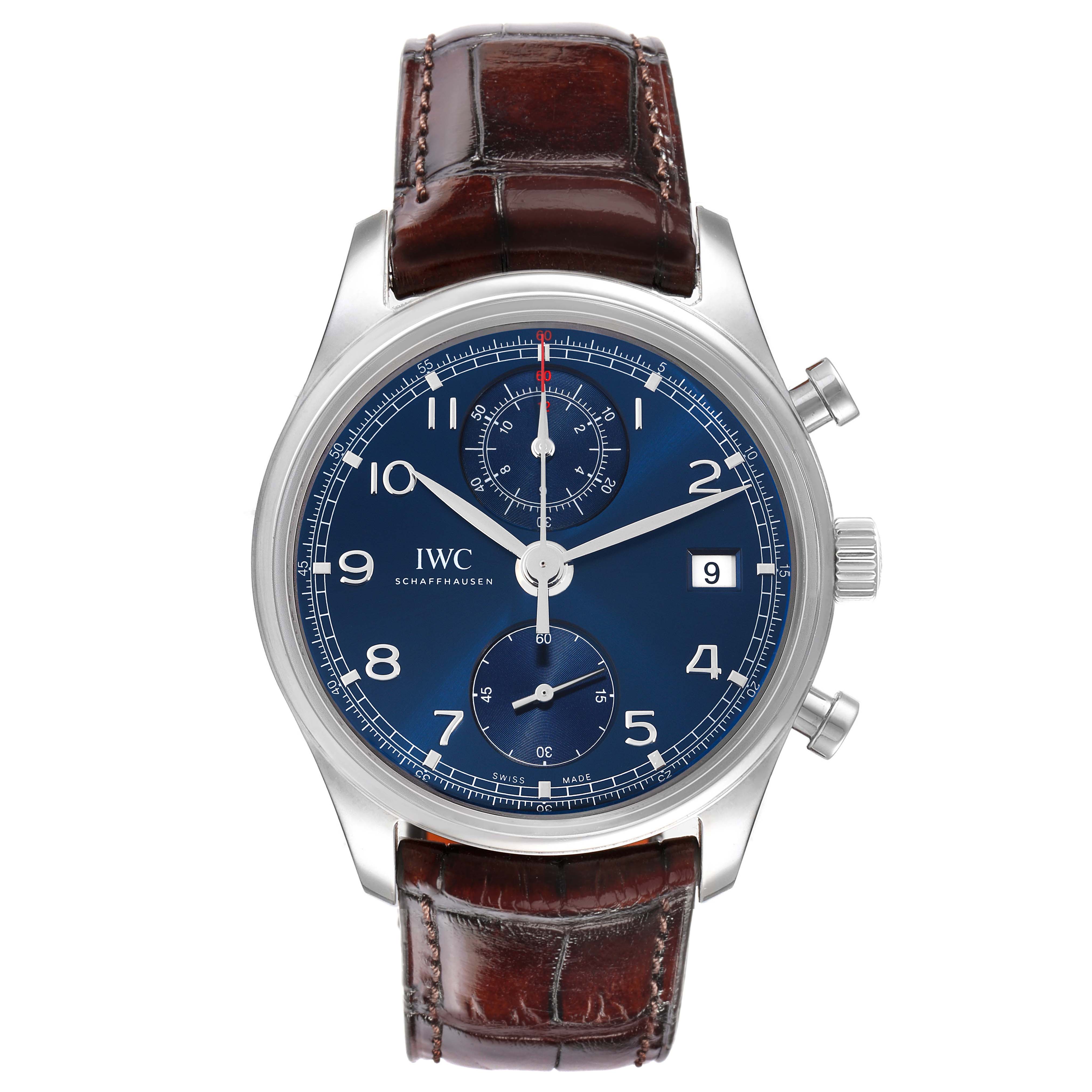 The IWC Portuguese model IW390406 is shown from a top-down angle, highlighting its blue dial, brown leather strap, subdials, and crown with pushers.