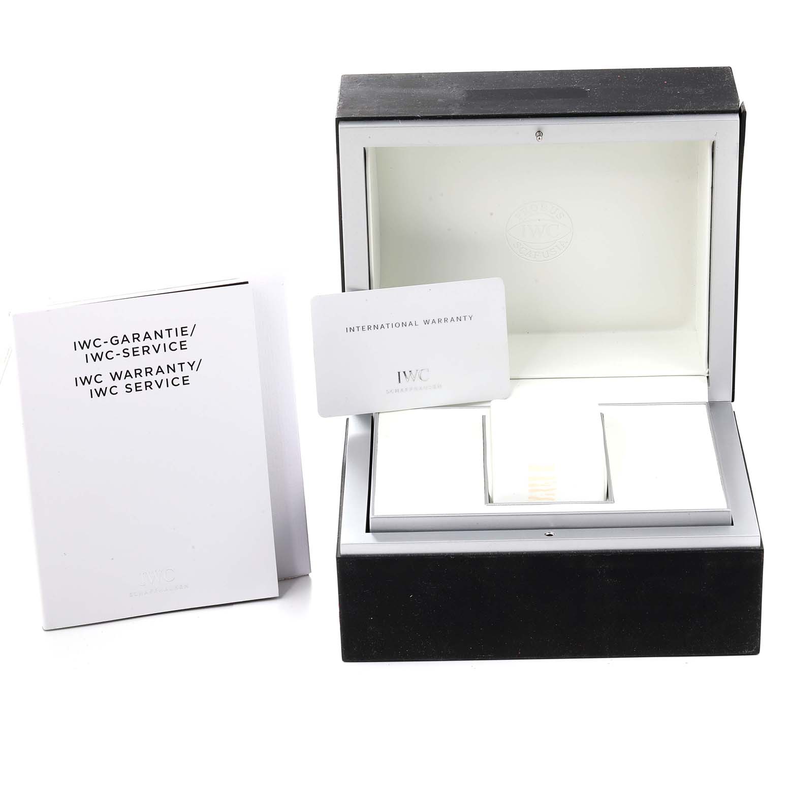 The image shows the packaging of the IWC Portuguese model IW390406 men's watch, featuring an open box, international warranty card, and service booklet.