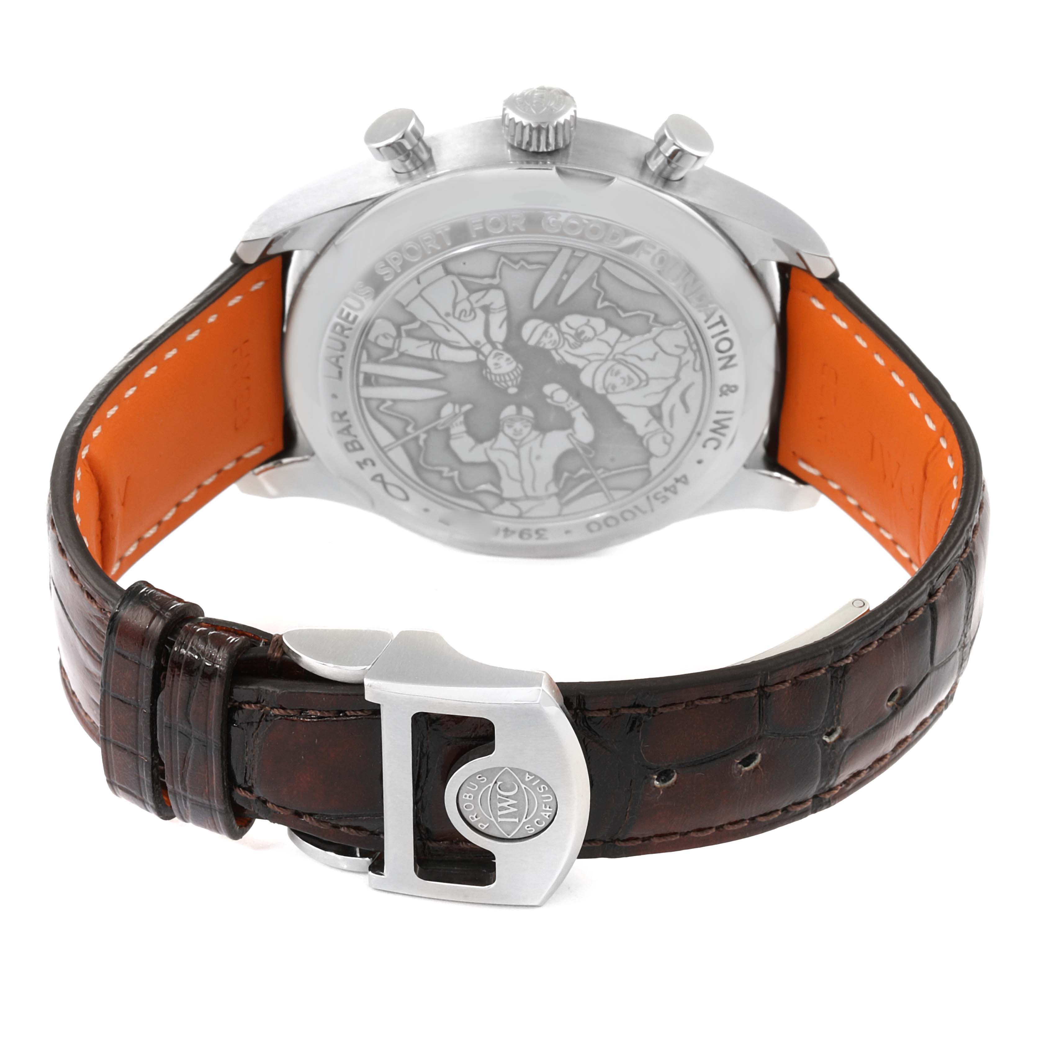 The IWC Portuguese IW390406 men's watch is shown from the back, displaying the case back engraving, crown, pushers, and leather strap with a buckle.