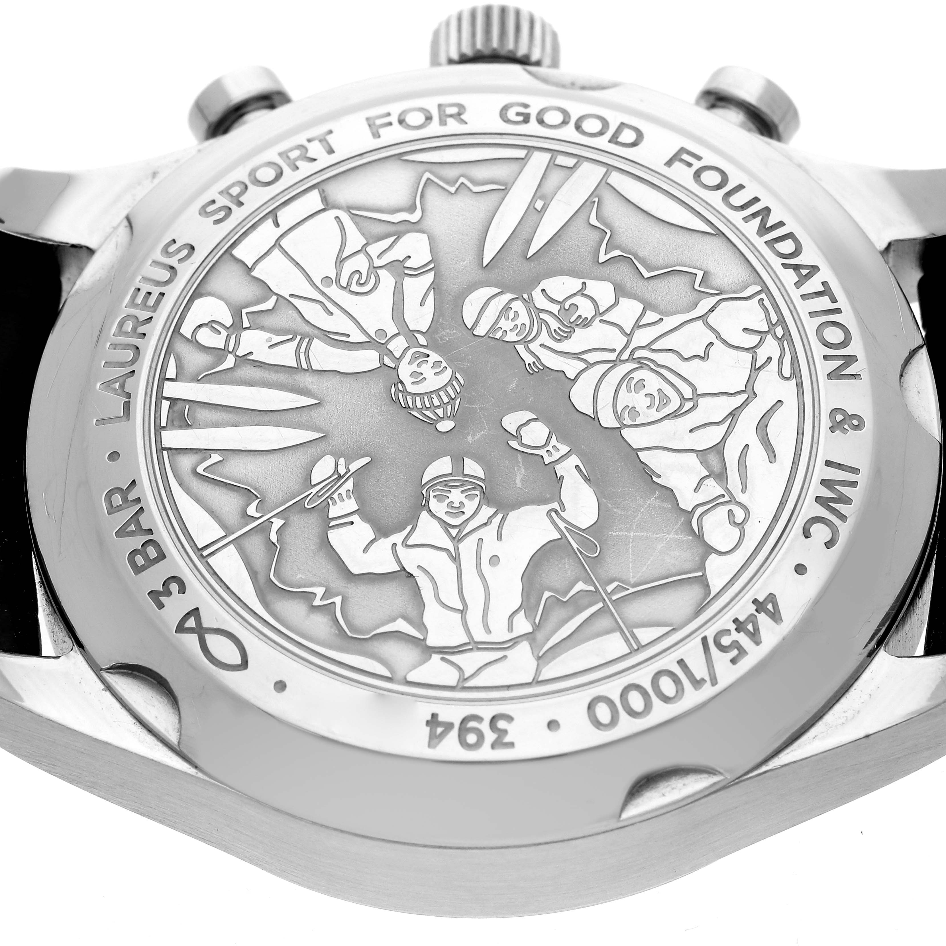 The image shows the back of an IWC Portuguese model IW390406 men's watch, featuring engraved details and text around the case.