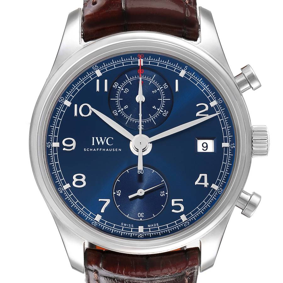The IWC Portuguese IW390406 men's watch is shown from a front angle, highlighting its blue dial, chronograph subdials, date display, and leather strap.