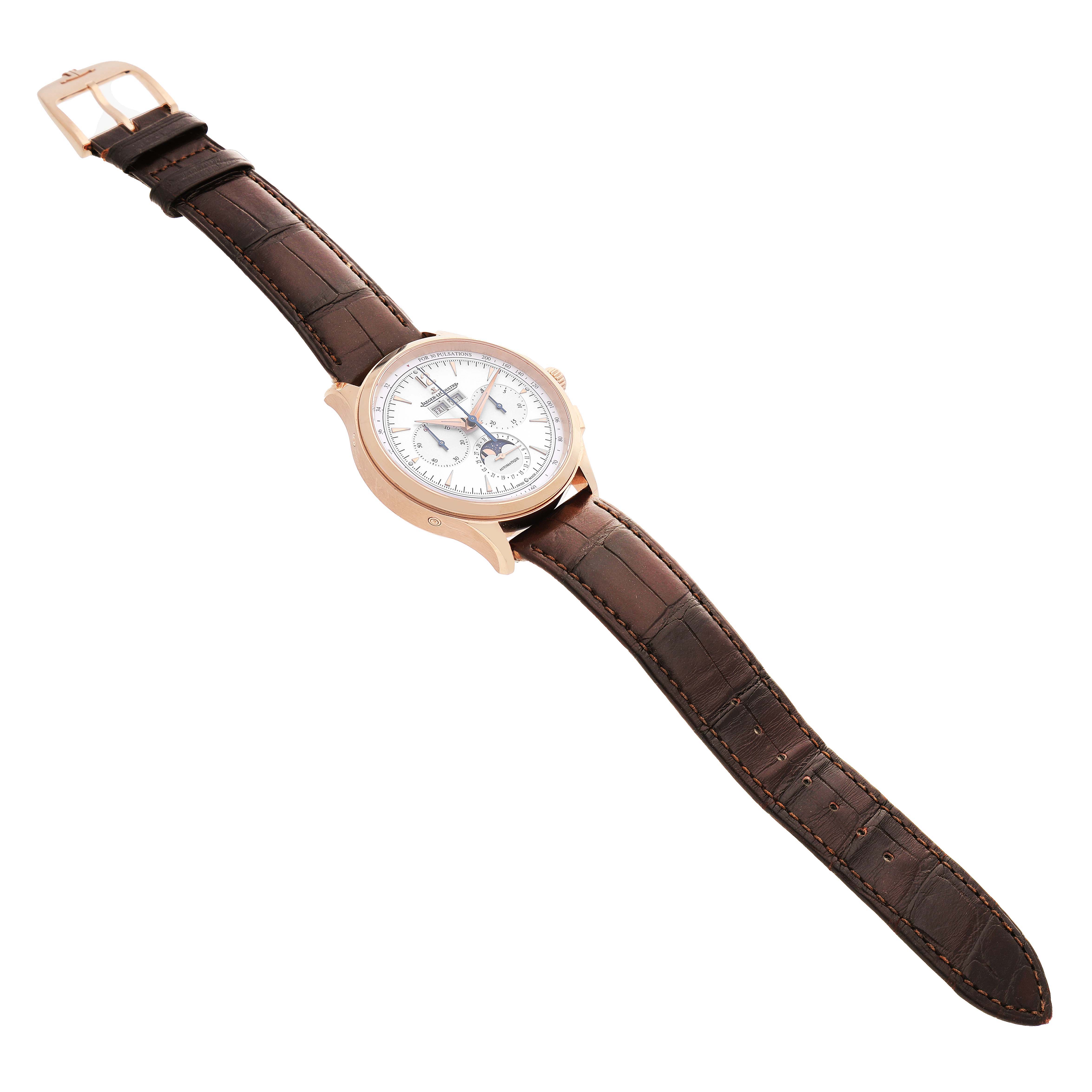 The Jaeger LeCoultre Master Q4132520 Men's Rose Gold Silver Dial watch is shown from an angled top view, displaying the face, brown leather strap, and clasp.