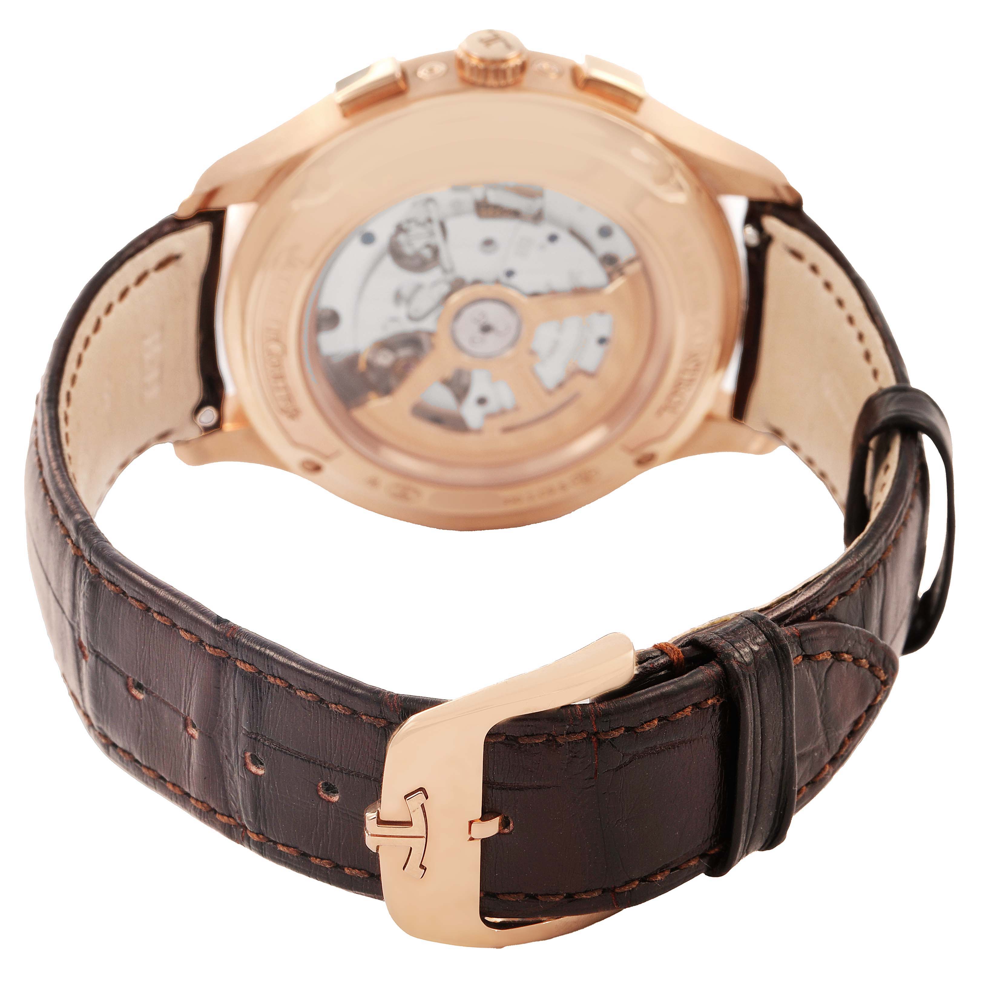 The image shows the back view of a Jaeger LeCoultre Master Q4132520 Men's Rose Gold Silver Dial model, highlighting the transparent case back and leather strap.