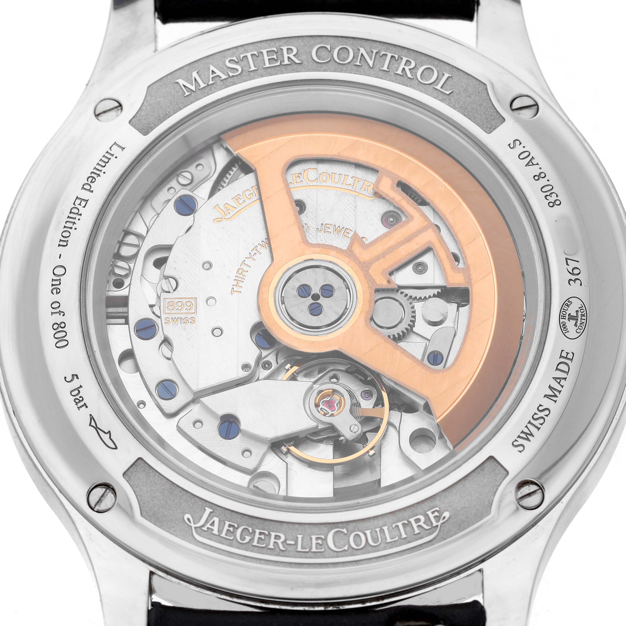 The image shows the back view of a Jaeger LeCoultre Master Q4018480 Men's Stainless Steel Blue Dial Control model, highlighting the movement and rotor.