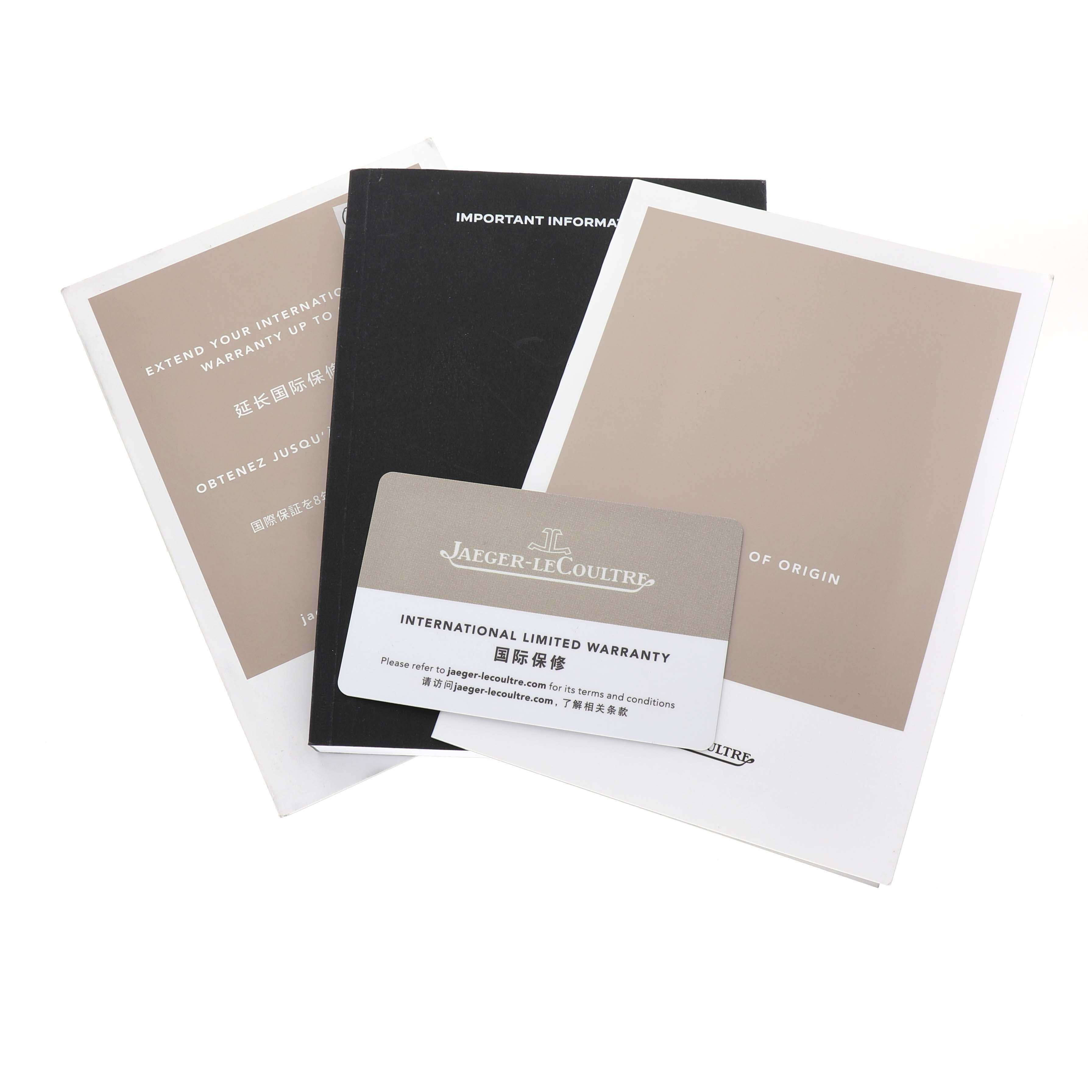 The image shows warranty cards and booklets for a Jaeger LeCoultre Master Q4018480 Men's Stainless Steel Blue Dial model watch.