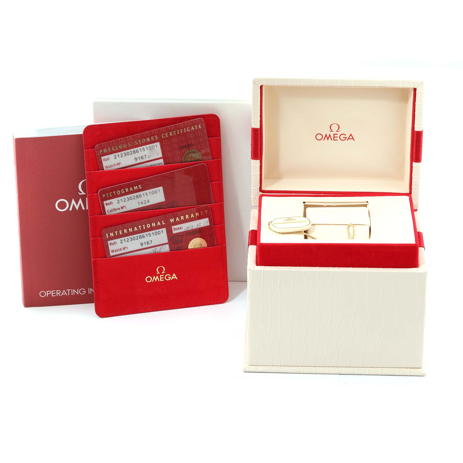 The image shows an Omega 212.30.28.61.51.001 Women's Stainless Steel Black Dial 212.30.28.61.51.001 Women's Stainless Steel Black Dial Seamaster Diamond Dial Steel Ladies Watch 212.30.28.61.51.001 with its box, warranty cards, and operating instructions.