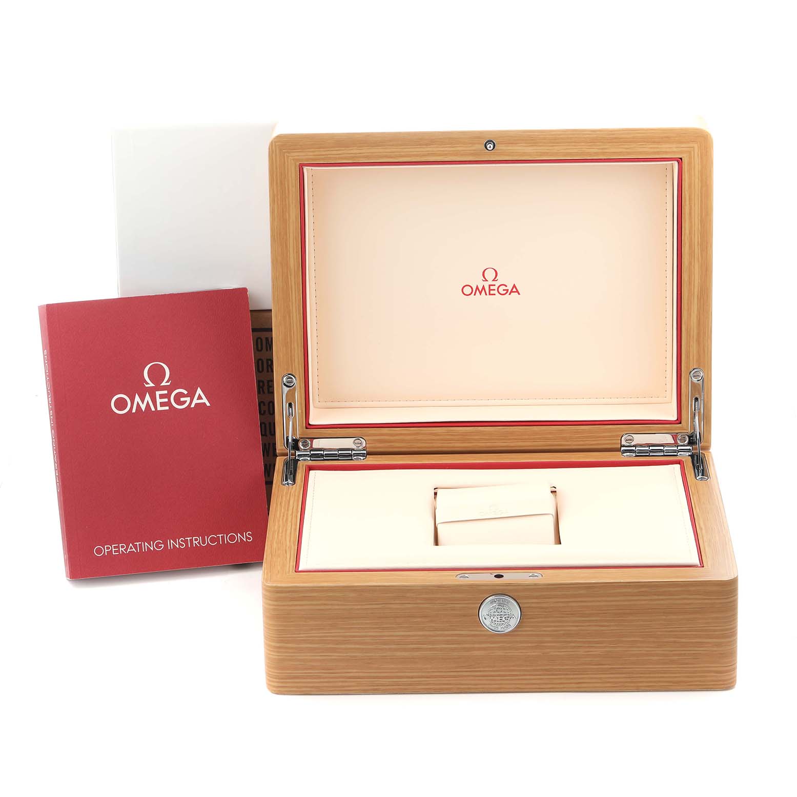 The image shows the open wooden box for the Omega Planet Ocean model 215.30.44.21.01.001, with the interior and operating instructions booklet visible.