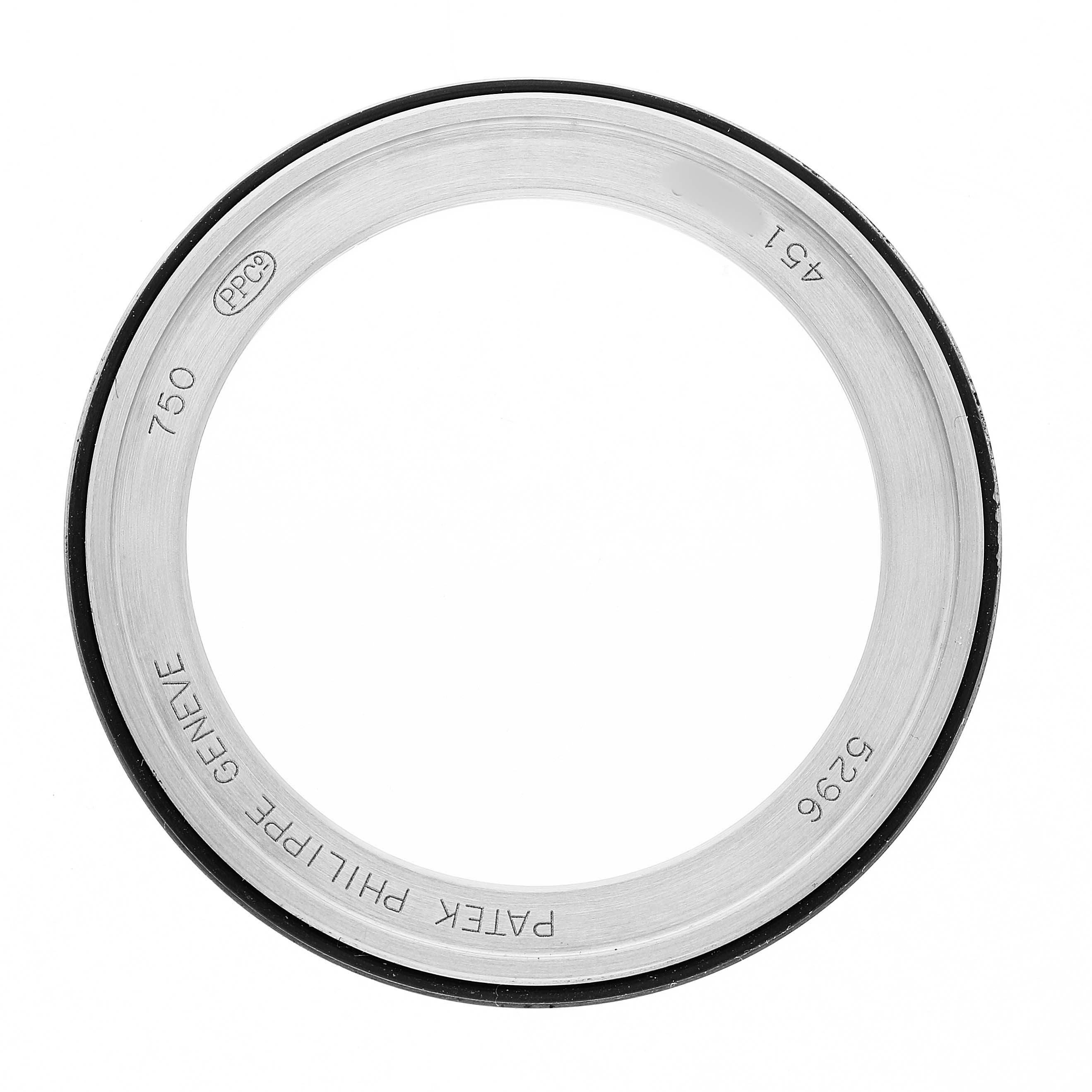 The image shows the bezel or caseback ring of a Patek Philippe Calatrava 5296G-010 Men's White Gold Silver Dial watch, viewed from above.