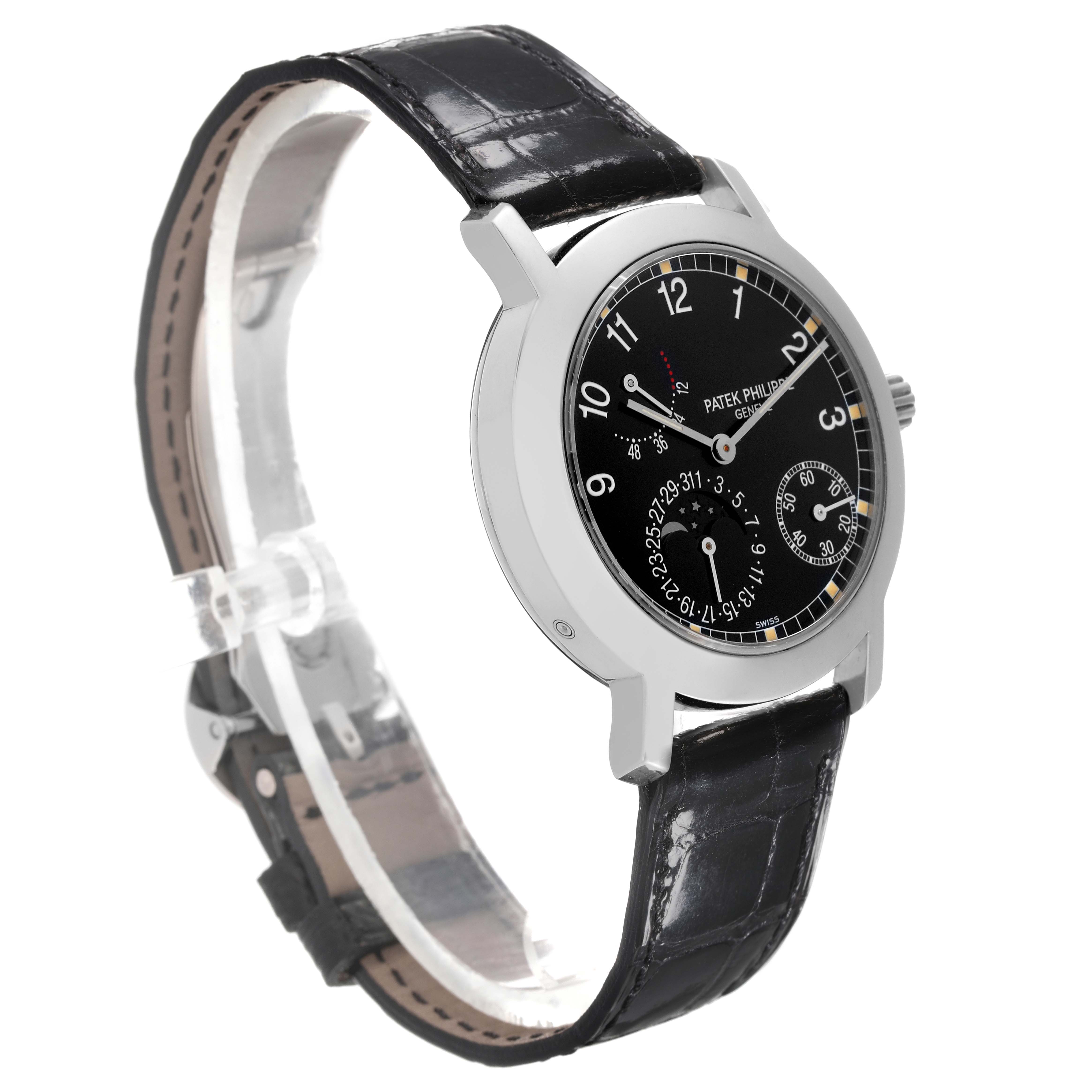 This image shows a side angle view of the Patek Philippe Complications 5055G-010 Men's White Gold Black Dial 5055G-010 Men's White Gold Black Dial watch, displaying its black dial and leather strap.