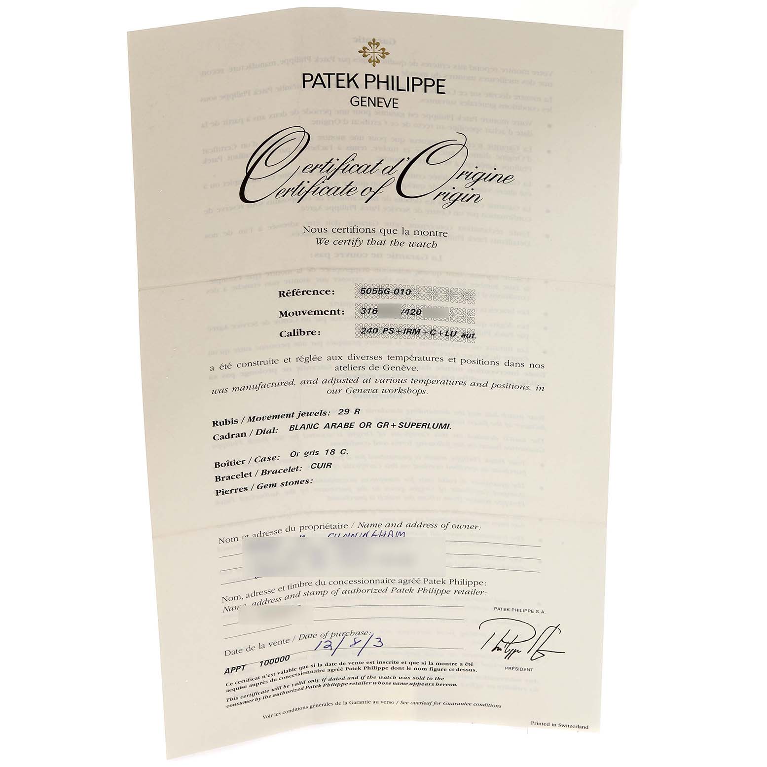 The image shows the Certificate of Origin and warranty paper for the Patek Philippe Complications 5055G-010 Men's White Gold Black Dial 5055G-010 Men's White Gold Black Dial model.