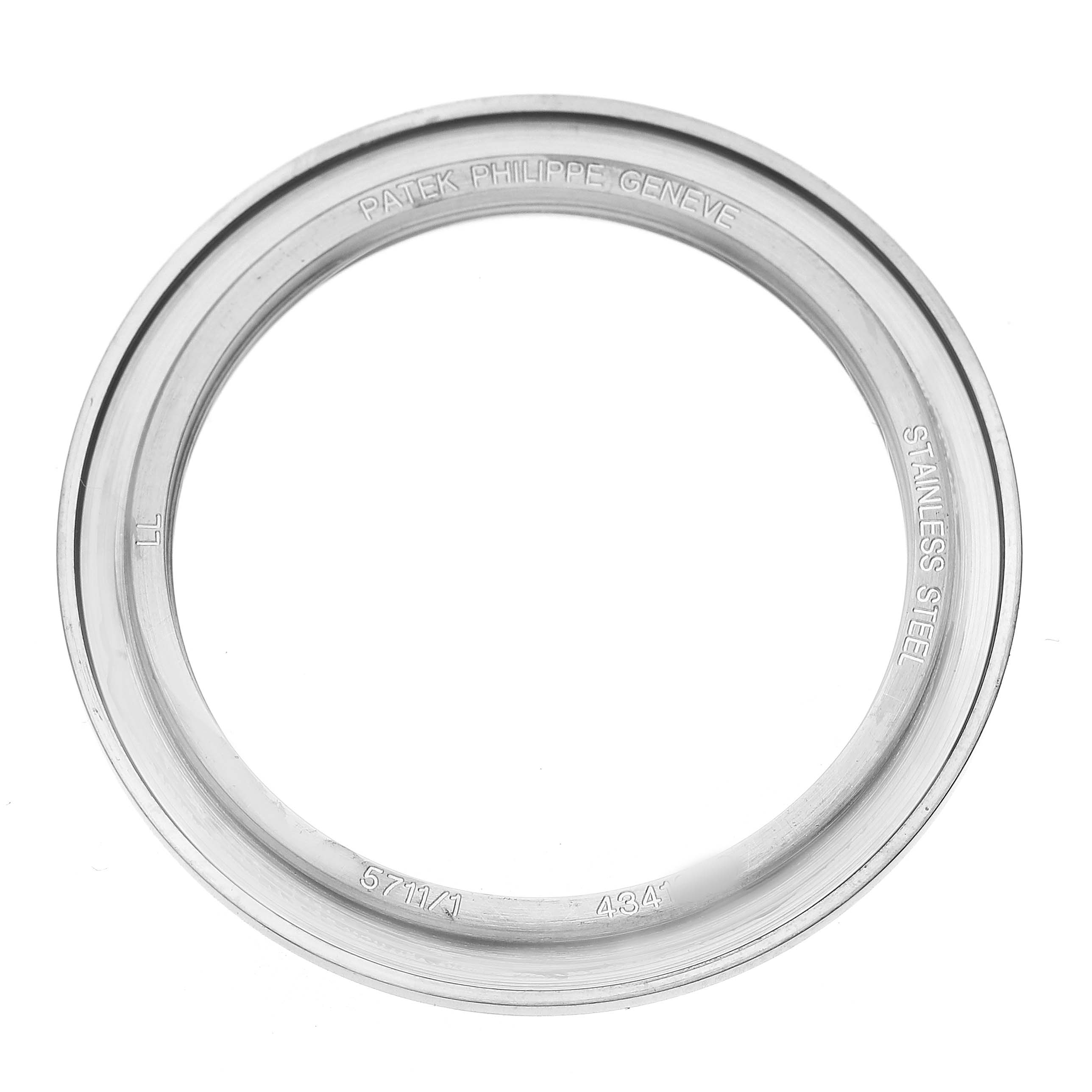 The image shows a stainless steel bezel for a Patek Philippe Nautilus 5711/1A-001 Men's Stainless Steel Blue Dial watch from a top-down angle.