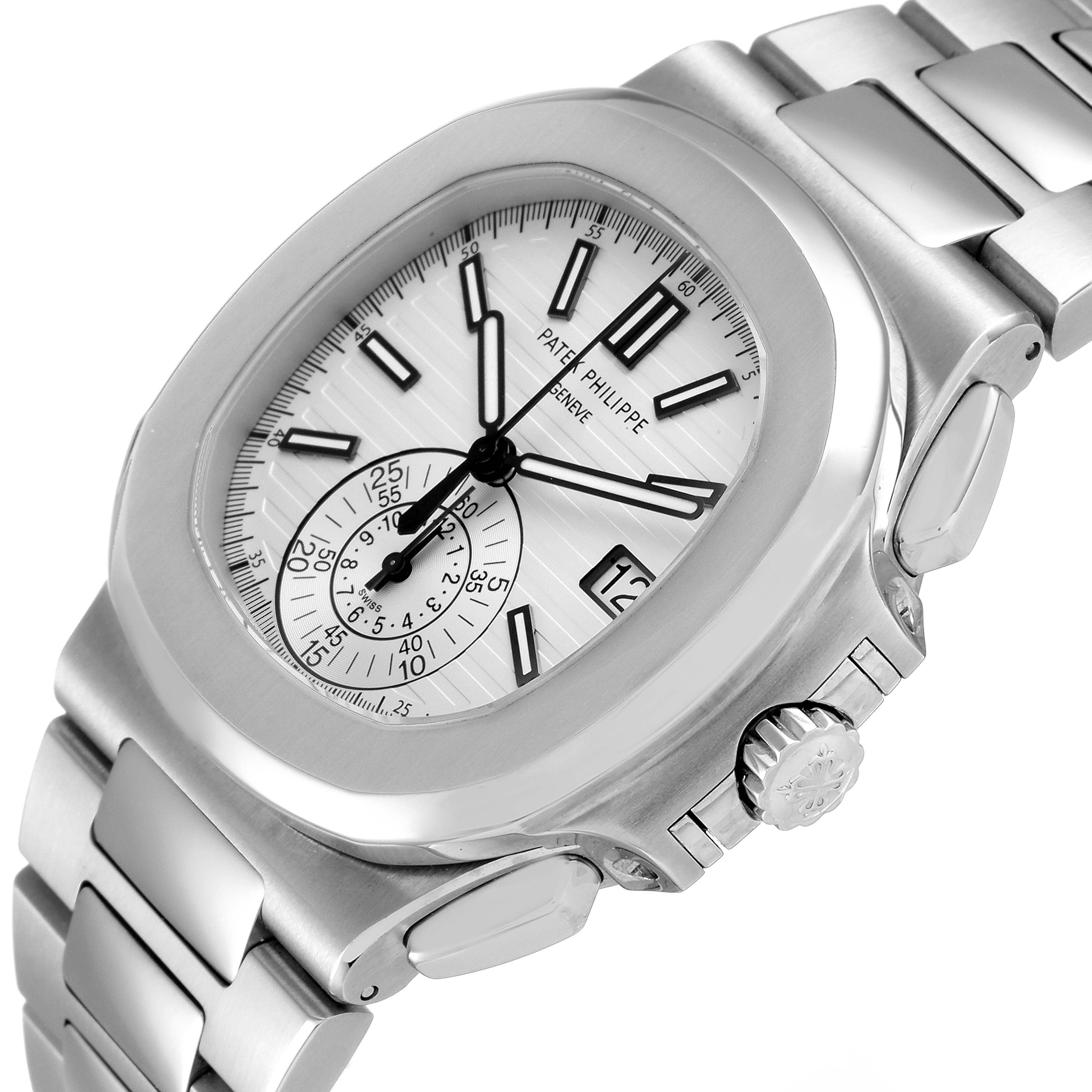 The image shows a Patek Philippe Nautilus 5980/1A-019 Men's Stainless Steel White Dial 5980/1A-019 Men's Stainless Steel White Dial watch at a three-quarter angle, highlighting the dial, crown, and bracelet.