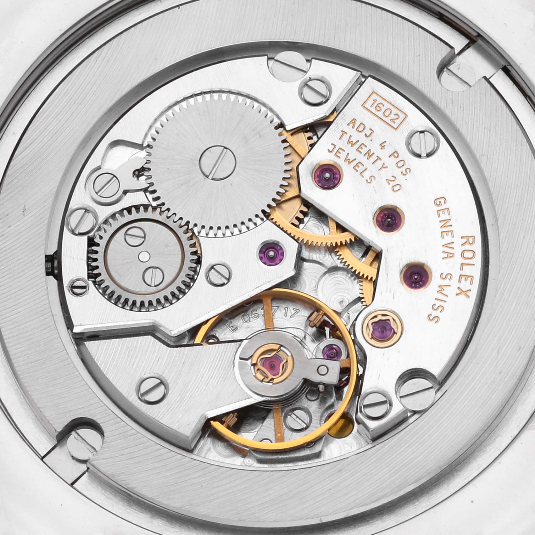 This image shows the internal mechanism of a Rolex Cellini 4233 Men's White Gold White Dial 4233 Men's White Gold White Dial watch, viewed from the back, highlighting its gears and jewels.